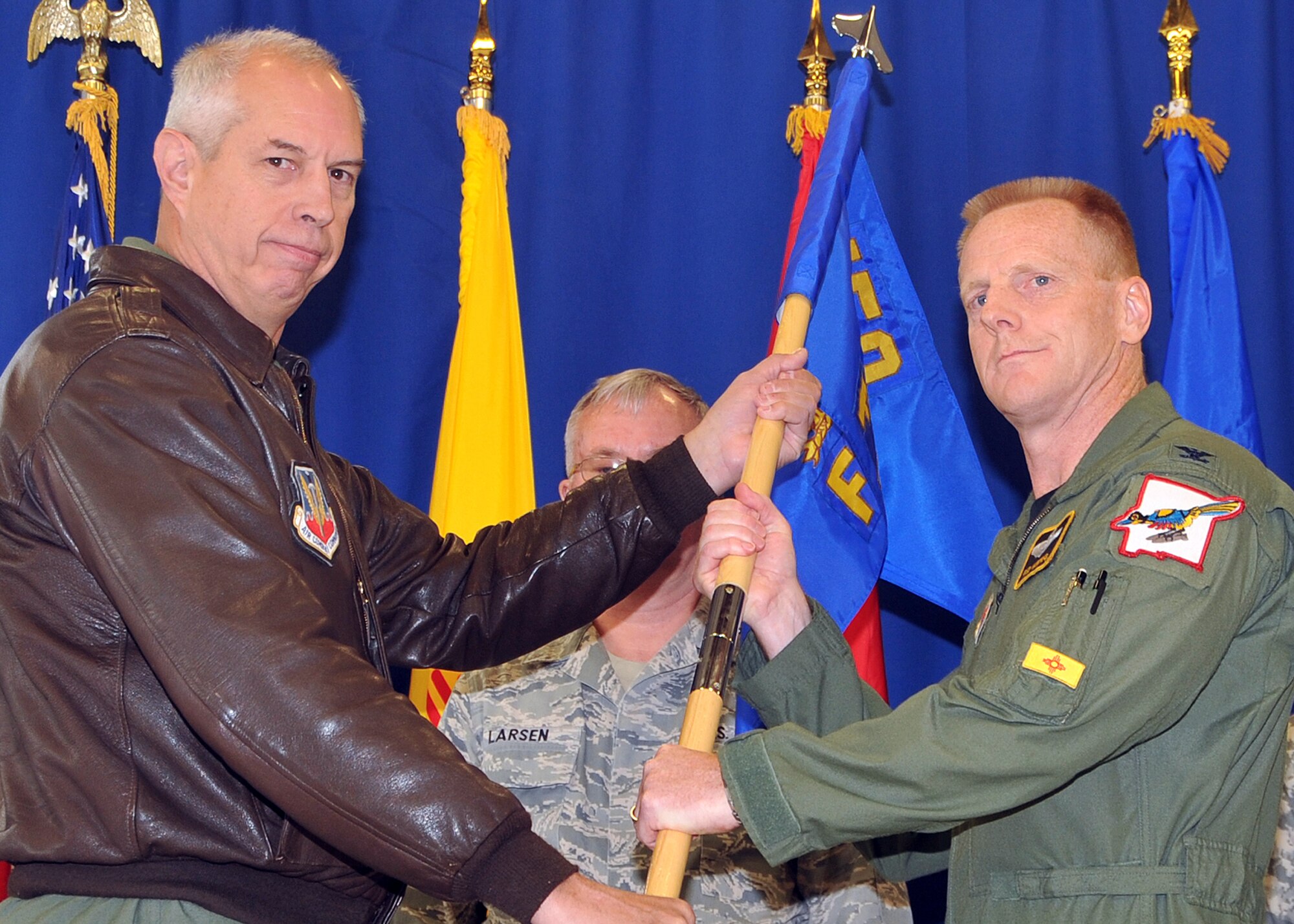 Brig. Gen. John D. Bledsoe Jr., chief of staff, New Mexico Air National Guard, left, gives Col. Frederick G. Hartwig command of the 150th Fighter Wing, March 14, during ceremonies at the unit.  Colonel Hartwig previously was the commander of the 150th Operations Group. He is a command pilot with more than 140 combat missions and 440 combat hours in the F-16. Colonel Hartwig is replacing Col. Francis X. Carillo who is retiring.

U.S. Air Force Photo by Todd Berenger