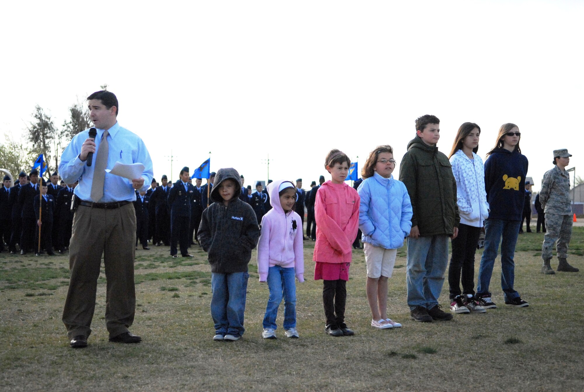 Branch Elementary School students and teachers gather to hear the announcement of the winners of the month-long read-a-thon.  Kevin Cordes, Branch Elementary School principal, announces the top readers from each grade.  From left to right, they are kindergartener Antonio Isla; 1st grader Taylor Cheney; 2nd grader Nadia Svejda; 3rd grader Hannah Vitt; 4th grader Micah Andrus; 5th grader Grace Johannesmeyer; and 6th grader Niki White. (Air Force photo/Stephen Robinson)
