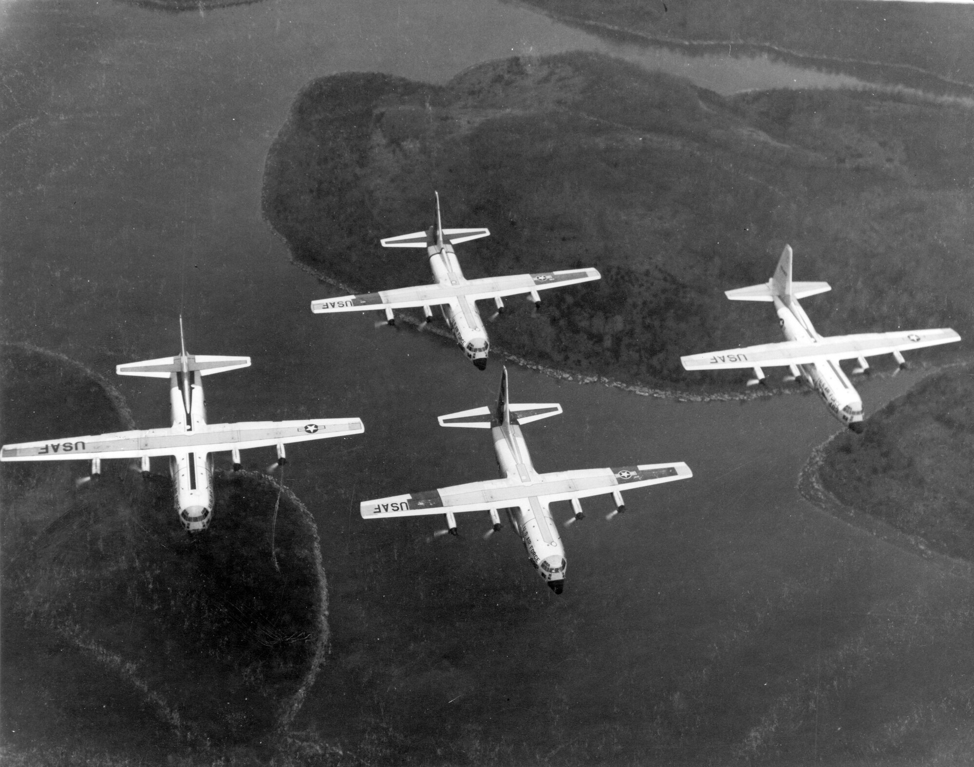 The Four Horsemen demonstration team flies in a diamond formation. The Four Horsemen were a number of pilots that flew close formation aerial demonstrations in any four C-130s on the tarmac that maintenance deemed serviceable. (Courtesy photo)