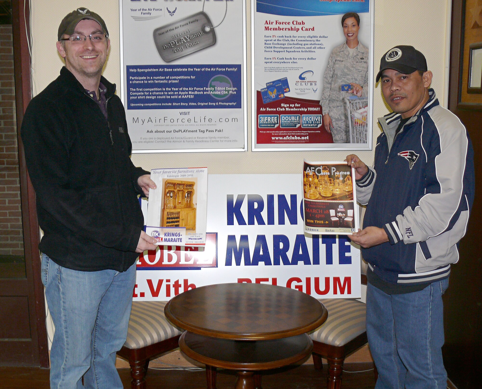 SPANGDAHLEM AIR BASE, Germany – Andy Rice, 52nd Force Support Squadron recreation technician, left, presents a chess table and chair set to Master Sgt. George Imperial, 52nd Logistics Readiness Squadron, after he won a wing-wide chess tournament March 28. Sergeant Imperial has been playing chess since he was 6 years old. (courtesy photo)
