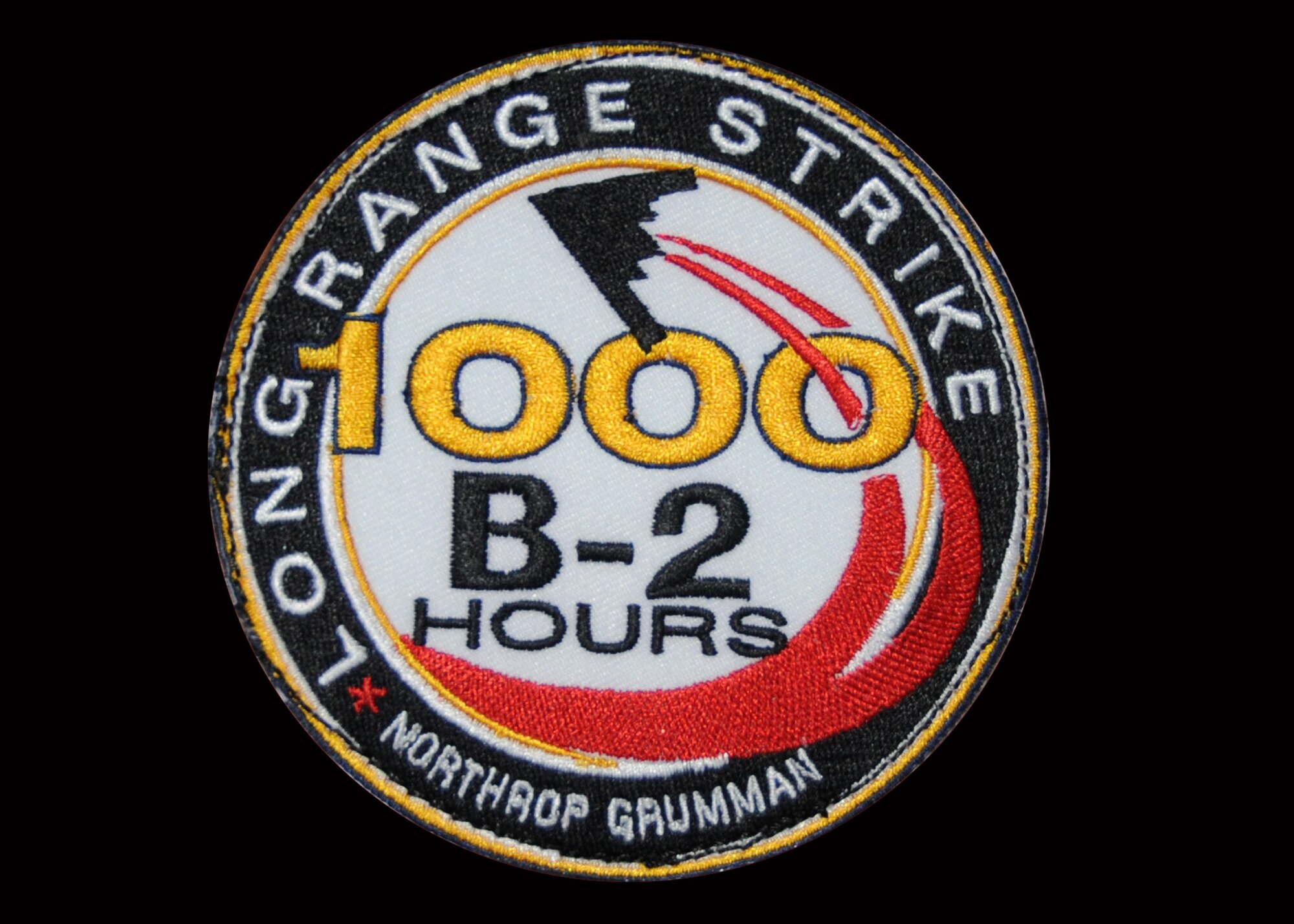 A closeup of the 1000 hours flying patch worn by B-2 pilots who have achieved this milestone in flying the B-2 bomber. There are almost 500 pilots who have flown the B-2 Spirit, but only about 30 who have reached 1,000 flying hours.  Four of these elite pilots are 131st Bomb Wing Missouri Air National Guard members at Whiteman Air Force Base, Mo:  Lt. Col. Michael Means who achieved this milestone almost three years ago while on active duty; Lt. Col. Rhett Binger, Jun 2009; and Maj. Jared Kennish, Oct.2009; and Maj. John Avery, Mar. 2010. (Air Force Photo by Master Sgt. Mary-Dale Amison.  RELEASED)