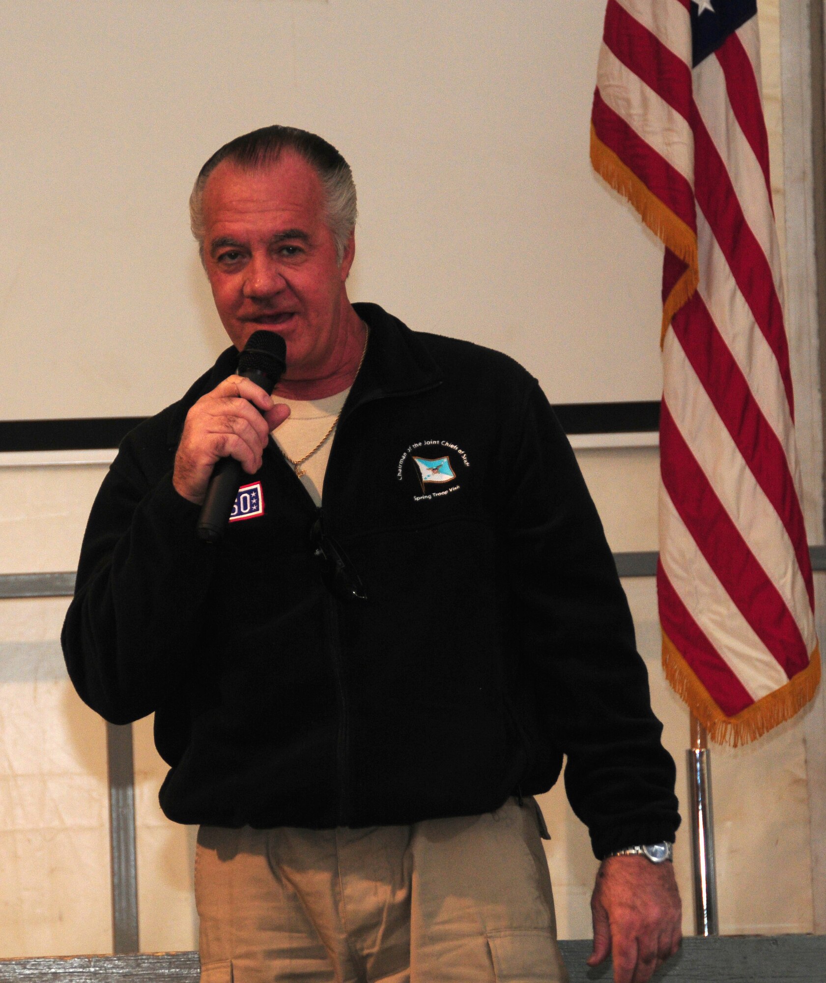SOUTHWEST ASIA -- Tony Sirico, best known for his character "Pauly" on the HBO series "The Sopranos", thanks military members, Department of Defense civilians and contract professionals for their service during a USO tour March 31, 2010 at an air base in Southwest Asia. Mr. Sirico accompanied U.S. Navy Admiral Mike Mullen, chairman of the Joint Chiefs of Staff, actors James Gandolfini and Rose McGowan, and New Orleans Saints offensive tackle Jon Stinchcomb on a USO sponsored tour of the U.S. Central Command area of responsibility.  (U.S. Air Force photo by Staff Sgt. Lakisha A. Croley/Released)