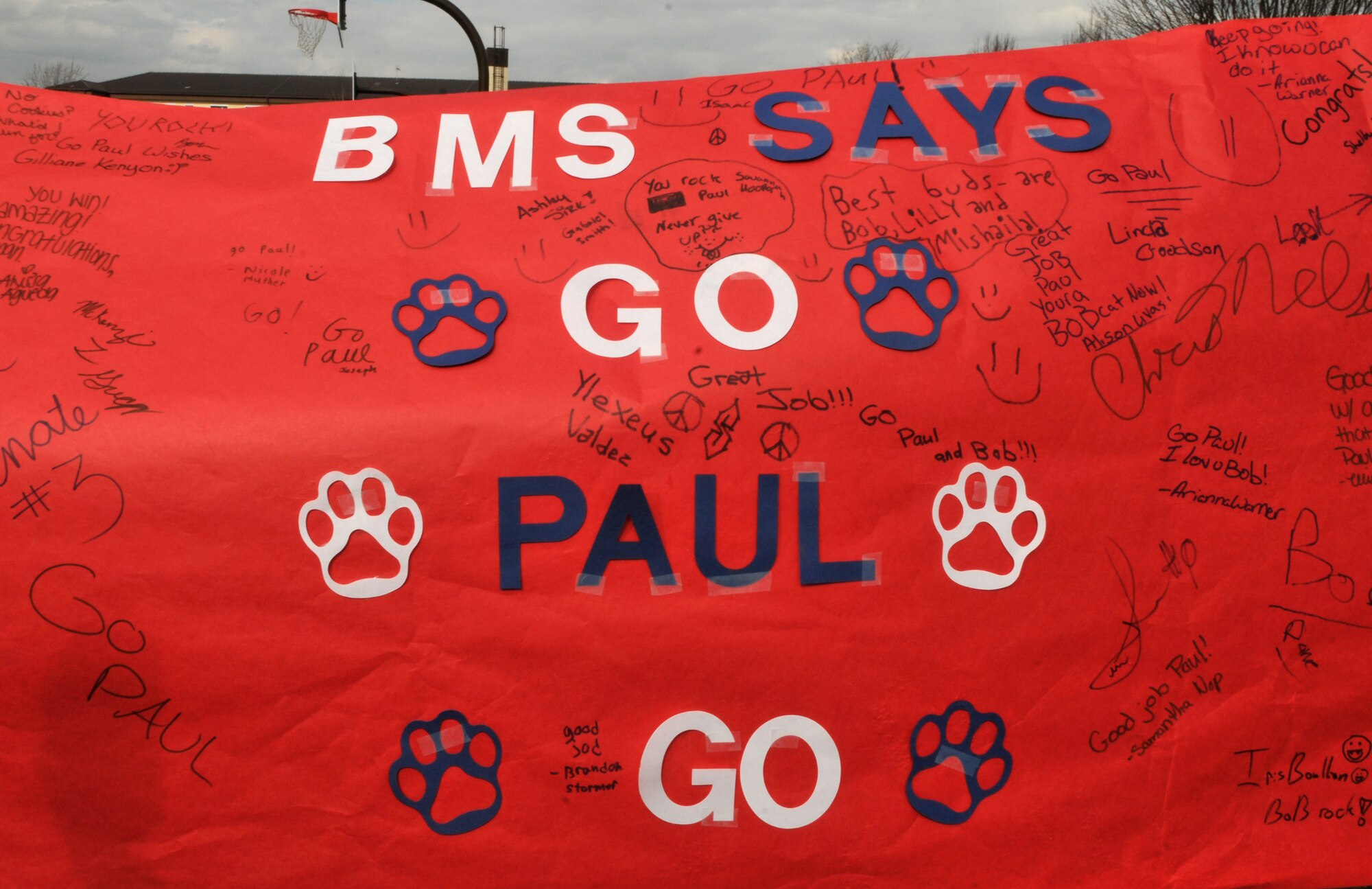 BITBURG ANNEX, Germany -- A poster supporting Paul Staso, a world class ultra-marathon runner, is displayed outside Bitburg Middle School March 25. Mr. Staso founded Promoting Active Children Everywhere Foundation and recently began running 500 miles across Germany visiting Department of Defense Dependents Schools along the way. (U.S. Air Force photo/Airman 1st Class Nick Wilson)