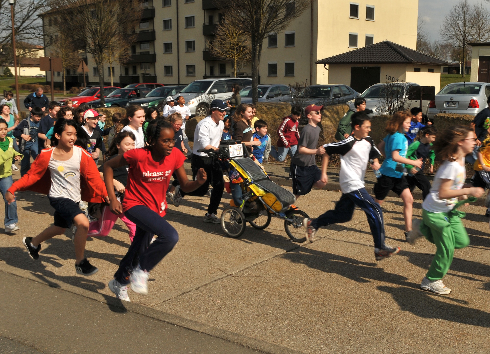 BITBURG ANNEX, Germany -- Bitburg Middle School students run with Paul Staso, a world class ultra-marathon runner, during his visit March 25. Mr. Staso founded Promoting Active Children Everywhere Foundation and recently began running 500 miles across Germany visiting Department of Defense Dependents Schools along the way. (U.S. Air Force photo/Airman 1st Class Nick Wilson)
