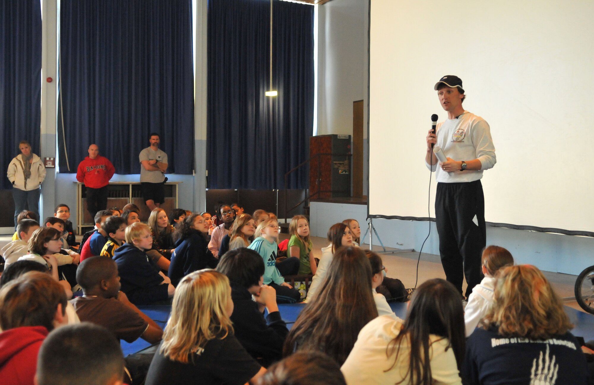 BITBURG ANNEX, Germany -- Paul Staso, a world class ultra-marathon runner, speaks to Bitburg Middle School students about the importance of a healthy lifestyle March 25. Mr. Staso founded Promoting Active Children Everywhere Foundation and recently began running 500 miles across Germany visiting Department of Defense Dependents Schools along the way. (U.S. Air Force photo/Airman 1st Class Nick Wilson)
