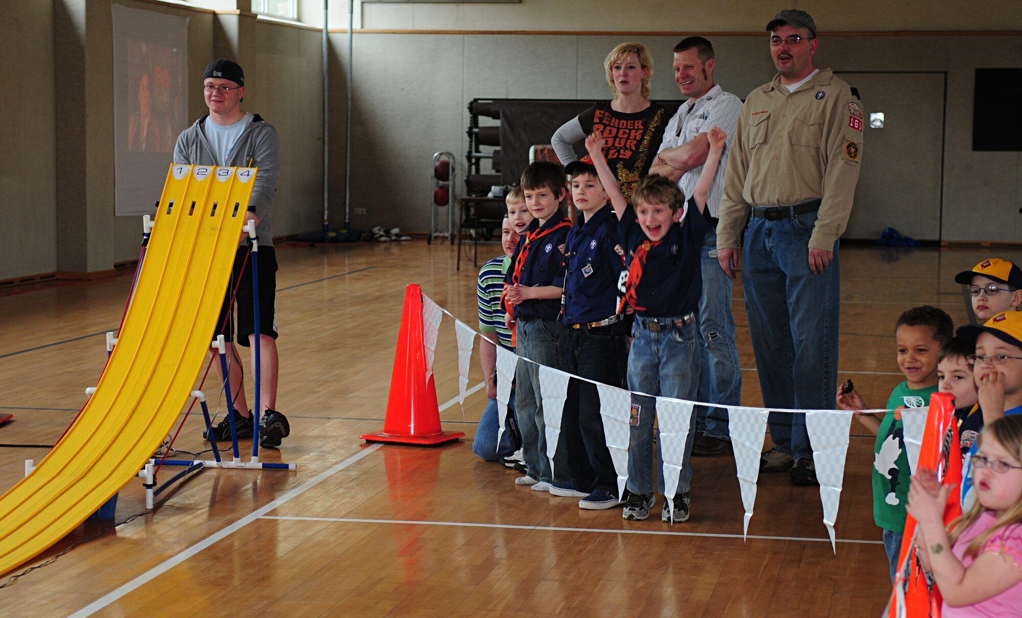 BITBURG ANNEX, Germany -- Nathan Davis cheers as his pinewood derby car wins four consecutive heats March 27.  Nathan advanced to the next round to compete for the annual Pinewood Derby title. (U.S. Air Force photo/Staff Sgt. Heather M. Norris)