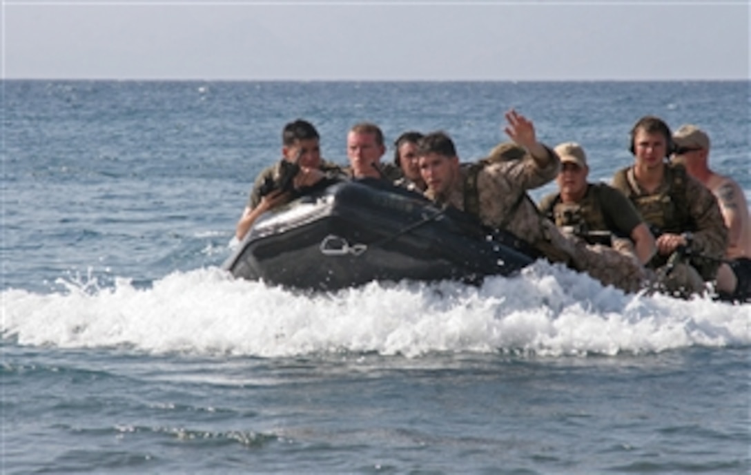 U.S. Marines from the 2nd Reconnaissance Battalion, Battalion Landing Team, 1st Battalion, 9th Marine Regiment, 24th Marine Expeditionary Unit participate in sustainment training in Djibouti on March 18, 2010.  The training includes a Helo-casting mission out the back of a CH-53 Super Stallion helicopter and a closed-circuit dive.  The 24th Marine Expeditionary Unit is a rapid-response force that performs various full-scale missions, from humanitarian relief efforts to combat operations.  