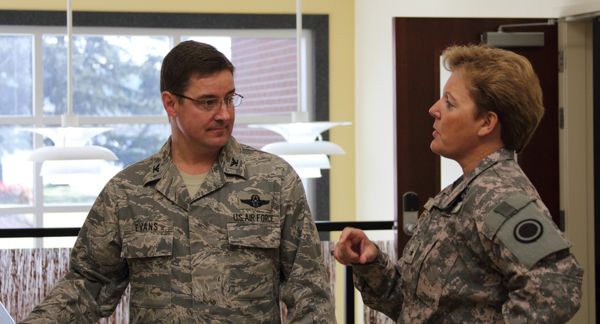 Col. Rob Evans, the I-CORPS Air Liaison Officer and 1st Air Support Operations Group commander, welcomes Brig. Gen. Heidi Brown, I-CORPS Deputy Commanding General for Sustainment and CORPS Senior Air Defense Officer,  during her visit to the 1st Air Support Operations Group and the 5th Air Support Operations Squadron. The Army’s I-CORPS Air and Missile Defense Detachment moved into 5th ASOG facilities following their return from Operation IRAQI FREEDOM.  Soldiers and Airmen will now work side by side at home station, strengthening the teamwork that will be critical in combat.