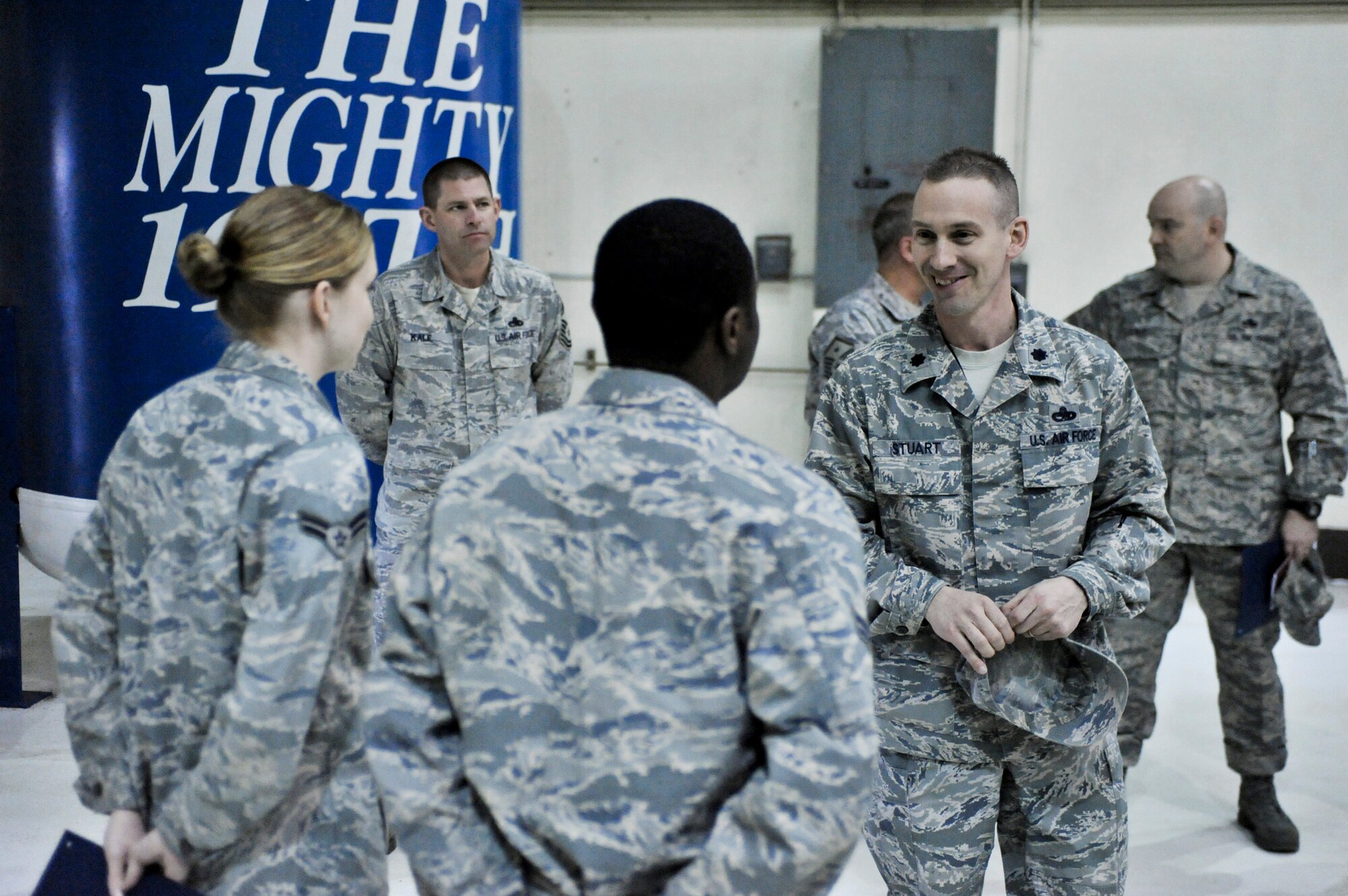 ELMENDORF AIR FORCE BASE, Alaska – Lt. Col. Brian Stuart, 3rd Aircraft Maintenance Squadron commander, recognizes Airmen from the 3rd AMXS who have been selected for below-the-zone promotion April 2. Colonel Stuart was recently named runner up for the 2009 Air Force Maintenance Effectiveness award for the medium aircraft category. (Air Force photo by Airman 1st Class Christopher Gross)