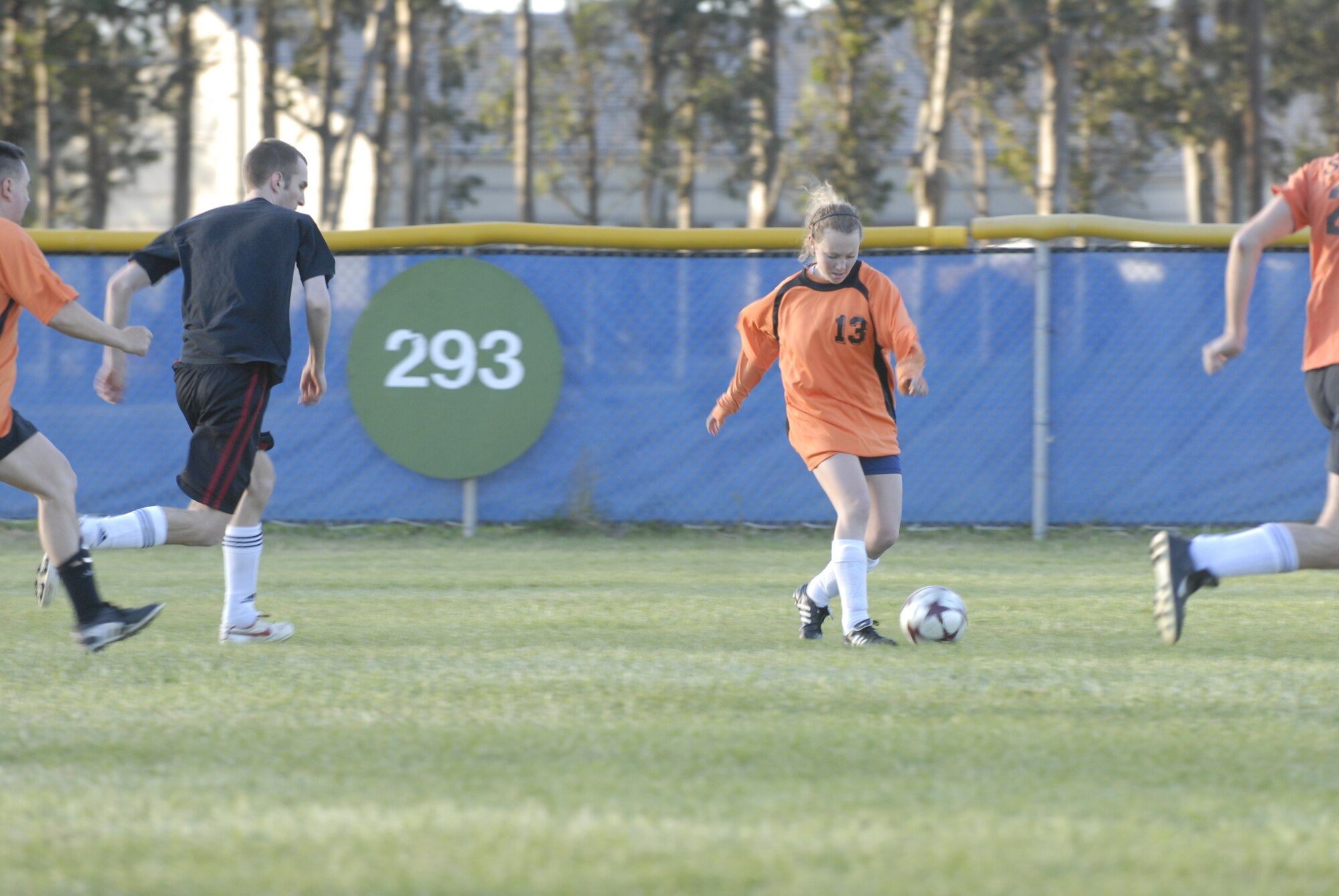 VANDENBERG AIR FORCE BASE, Calif. -- Making her way down the field, Margot Robohn, a 14th Air Force soccer team member, charges the opposing team’s goal here Thursday, April 1, 2010. The 30th Security Forces Squadron soccer team defeated the 14th AF soccer team 8 – 4 in an intramural match up. (U.S. Air Force photo/Senior Airman Ashley Reed)

