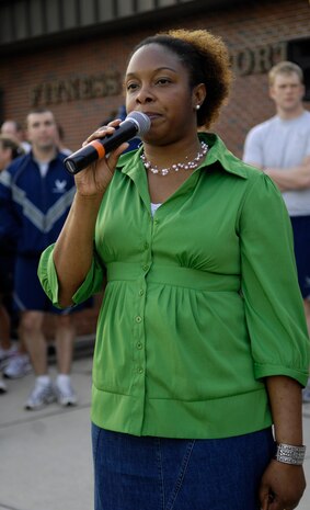 Adonika Jenkins speaks to Airmen about sexual assault awareness at the Commander's Fitness Challenge held on Joint Base Charleston, S.C., April 2, 2010. The month of April is nationally recognized as Sexual Assault and Child Abuse Awareness Month. This month's fitness challenge was called "The Run Against Rape" and was dedicated informing Airmen about the help which is readily available to them if they or a wingman are ever placed in a comprising situation. Ms. Jenkins is the Sexual Assault Response Coordinator for JB CHS. (U.S. Air Force Photo/Airman 1st Class Lauren Main)