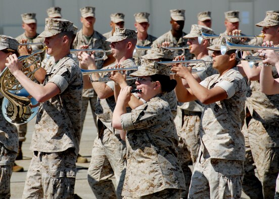 2nd Marine Aircraft Wing Band members play during the Marine Fighter Attack Training Squadron 501 stand-up ceremony April 2 at Eglin Air Force Base, Fla. The 501st becomes the first Marine JSF squadron and also the first Marine squadron embedded into a Air Force Wing. Maj. Gen. James F. Flock, 2nd Marine Aircraft Wing commander, called the occasion "the next chapter in the future of Marine aviation." The band came from Cherry Point, N.C. to perform at the ceremony. (U.S. Air Force photo/Samuel King Jr.)