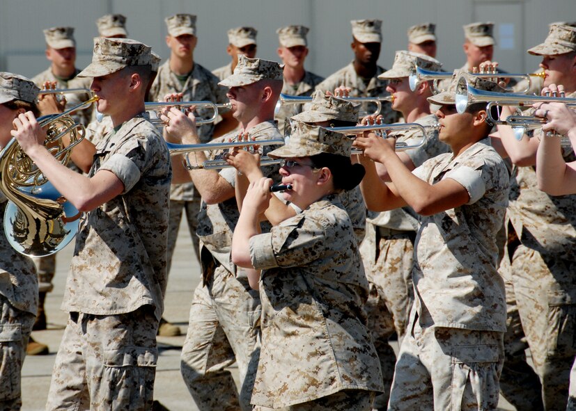 2nd Marine Aircraft Wing Band members play during the Marine Fighter Attack Training Squadron 501 stand-up ceremony April 2 at Eglin Air Force Base, Fla. The 501st becomes the first Marine JSF squadron and also the first Marine squadron embedded into a Air Force Wing. Maj. Gen. James F. Flock, 2nd Marine Aircraft Wing commander, called the occasion "the next chapter in the future of Marine aviation." The band came from Cherry Point, N.C. to perform at the ceremony. (U.S. Air Force photo/Samuel King Jr.)