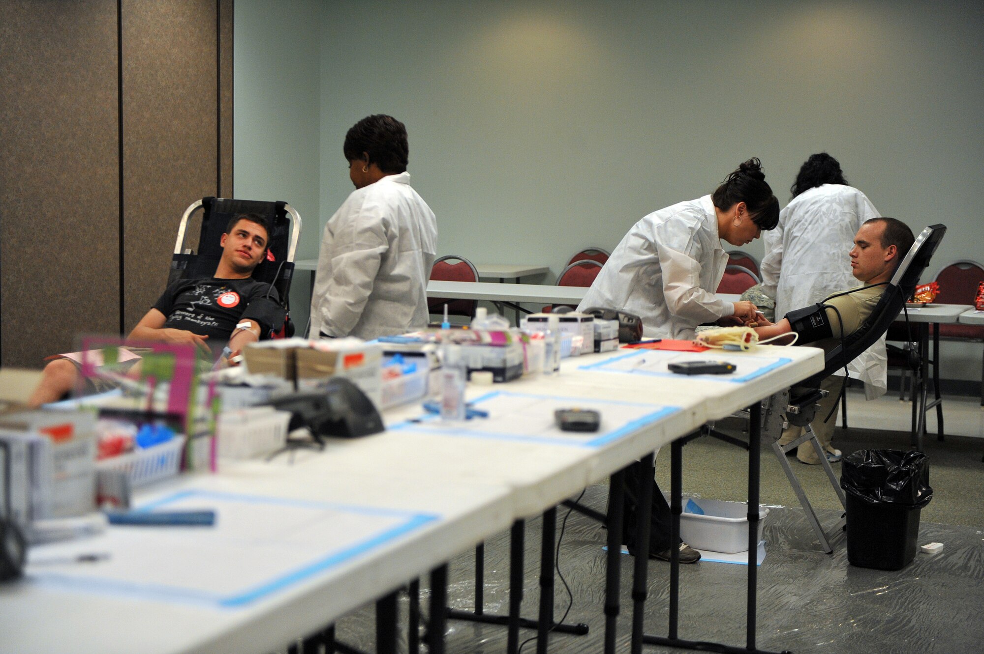 Moody Airmen wait patiently while donating blood during an ARC blood drive at the base chapel here April 2. The average adult has approximatley 10 pints of blood in thier body. (U.S. Air Force photo by Staff Sgt. Andrea Thacker/Released)