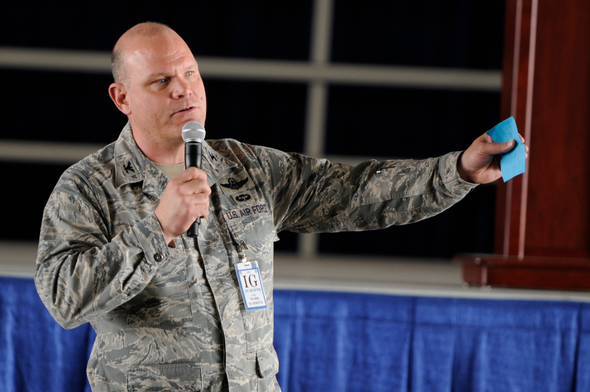 Col. Mark Schmitz, Air Mobility Command inspector general team lead, gives his remarks after the announcement of an excellent rating on the 375th Air Mobility Wing's Operational Readiness Inspection at Hangar 1, April 2, 2010. The AMC IG inspected the entire process of deploying combat ready Airmen and how they responded when put into combat situations. (U.S. Air Force photo by Staff Sgt. Brian J. Ellis)