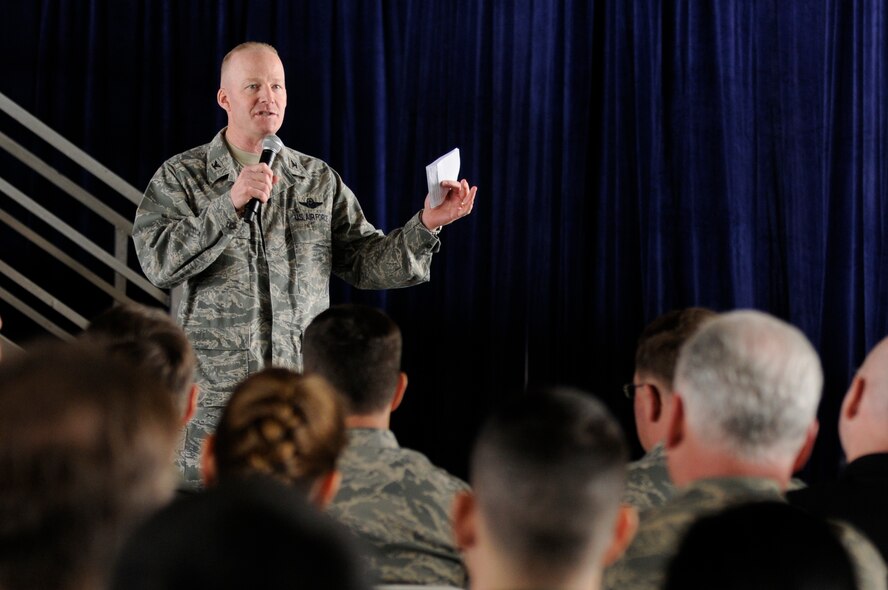 Col. Gary Goldstone, 375th Air Mobility Wing commander, congratulates wing personnel after the announcement of an excellent rating on its Operational Readiness Inspection at Hangar 1, April 2, 2010. The 375th AMW prepared for several months for the inspection and proved that it can deploy combat ready Airmen at a moment's notice. (U.S. Air Force photo by Staff Sgt. Brian J. Ellis)