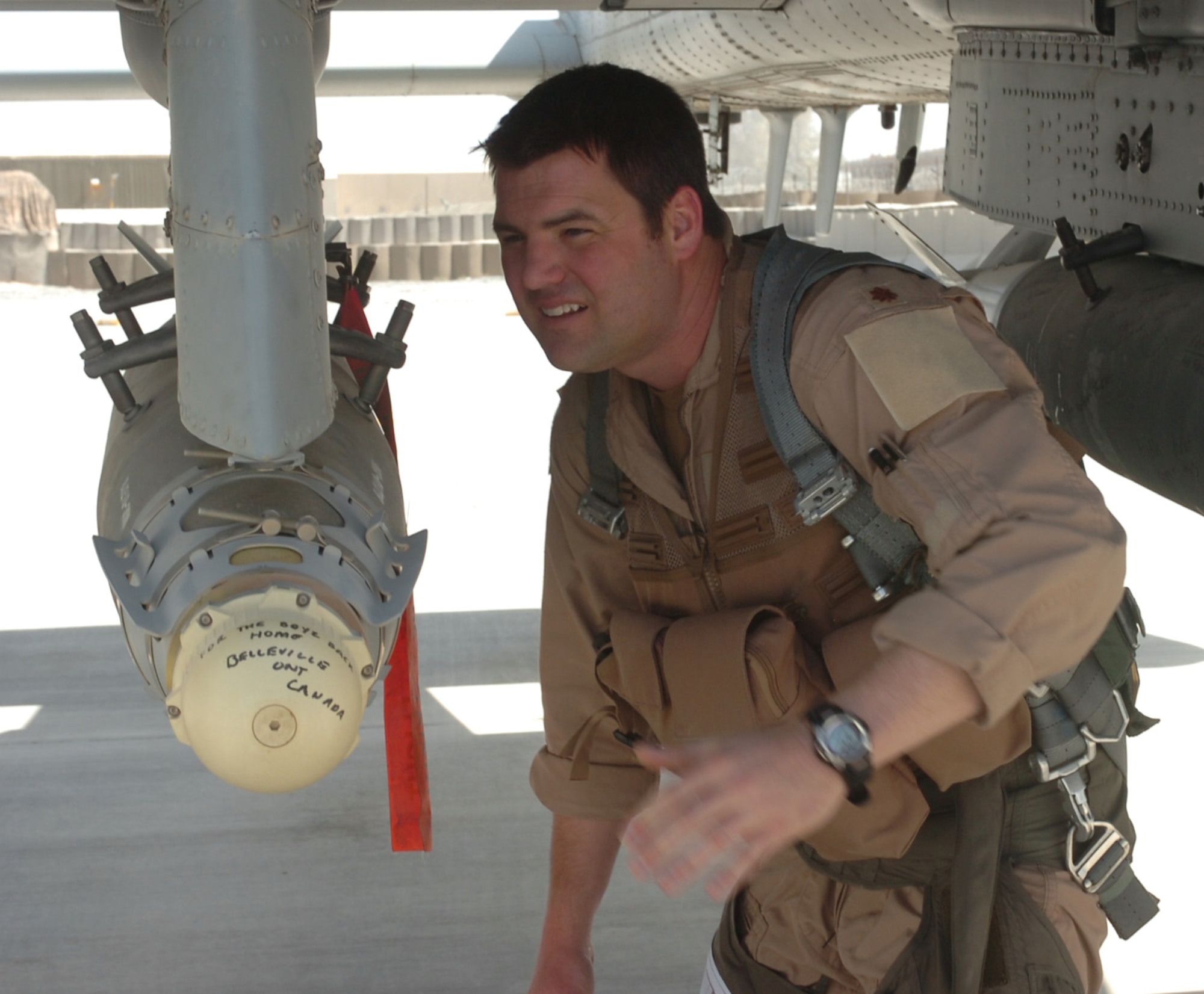 Maj. Brian Ahlert, an A-10C Thunderbolt II pilot from the 188th Fighter Wing of the Arkansas Air National Guard, based in Fort Smith, conducts preflight inspections on the weapons mountings before a flight on March 19, 2010, from Kandahar Airfield, Afghanistan. Ahlert is among more than 250 members of the 188th deployed as part of an Air Expeditionary Force rotation and is assigned to the 451st Fighter Wing at Kandahar. (Photo by Lt. Col. Keith Moore/Arkansas Air National Guard Public Affairs).