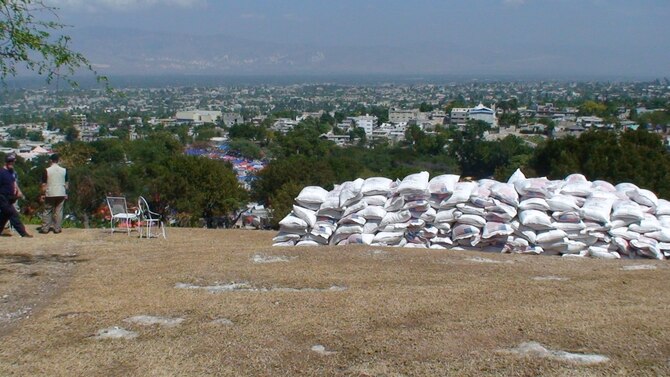 PORT-AU-PRINCE, Haiti -- Sacks of food sit at a food distribution point in Port-au-Prince, Haiti in March. Food is distributed at designated, controlled sites where it is needed most and where it can support the overall humanitarian effort going on in the rebuilding country. (Contributed U.S. Air Force photo/RELEASED)

