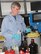 Quality Assurance Specialist James LaFave at the Air Force Petroleum Office cleans a distillation flask after working with JP-8 fuel. A DOD Live Bloggers Roundtable held March 25 featured experts who discussed first test flight of an A-10C Thunderbolt II powered by a blend of Hydro-treated Renewable Jet biofuel, or HRJ, and JP-8 at Eglin AFB, Fla. (U.S. Air Force photo/Bonnie White)