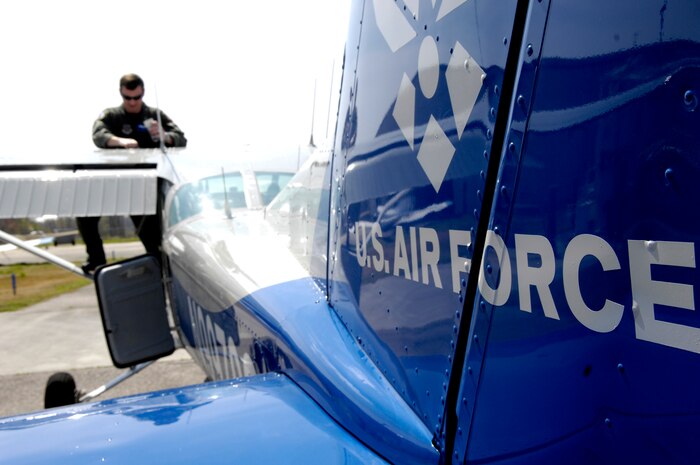 U.S. Air Force Staff Sgt. Jared Lambert performs a pre-flight inspection on a Cessna-172 at the Aero Club on Joint Base Charleston, S.C., March 25, 2010. Sergeant Lambert, a native Texan who has flown all of his life, plans to take over his family's crop dusting business. The business, Lambert Spraying, is owned and operated by a close family member who is currently the only pilot in the business. Sergeant Lambert is a loadmaster with the 437th Operations Support Squadron. (U.S. Air Force photo/Airman 1st Class Lauren Main)