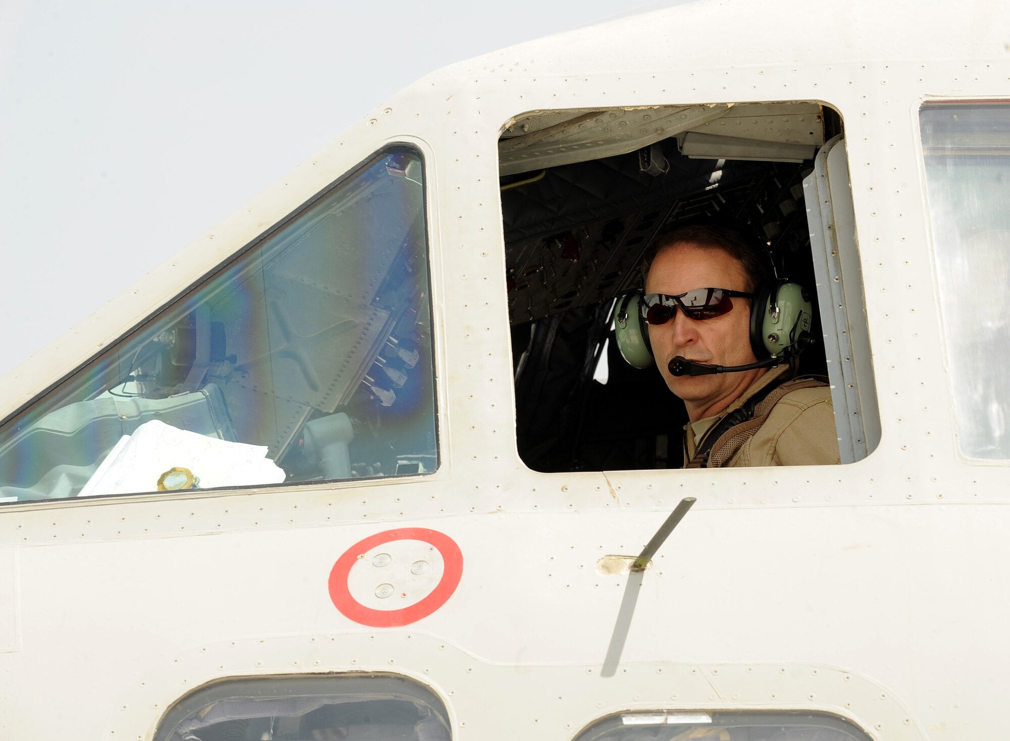 Brig. Gen. Michael Boera, 438th Air Expeditionary Wing and Combined Air Power Transition Force commander, prepares for takeoff in a C-27A Spartan March 28, 2010, at Camp Bastion, Afghanistan. (U.S. Air Force photo/Staff Sgt. Manuel J. Martinez/released)