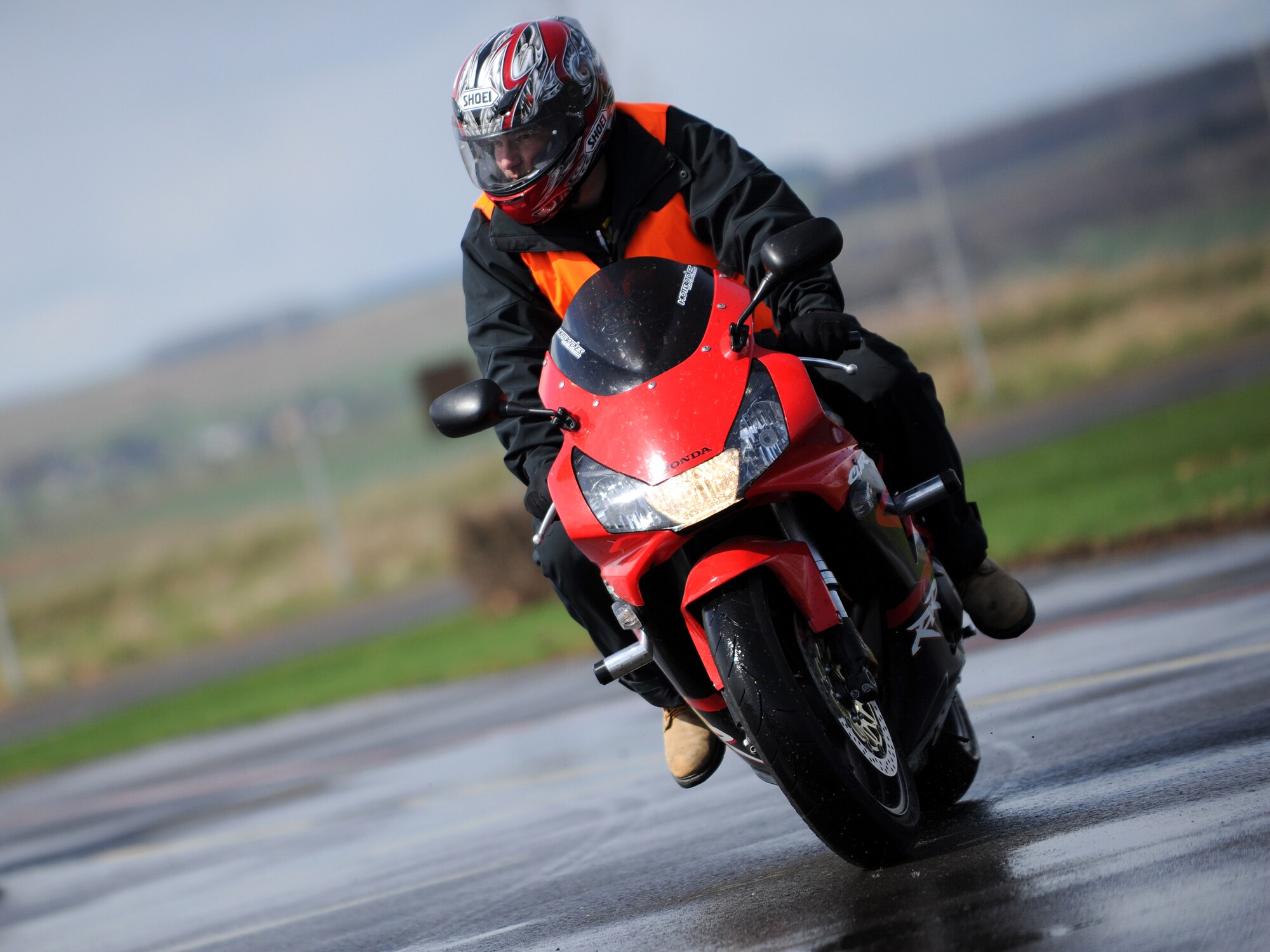 SPANGDAHLEM AIR BASE, Germany – Tech. Sgt. George Tharpe, 52nd Equipment Maintenance Squadron, manuevers his motorcycle around a turn during a motorcycle safety course April 1. The course is taught by certified instructors from the Motorcycle Safety Foundation. (U.S. Air Force photo/Senior Airman Nathanael Callon)