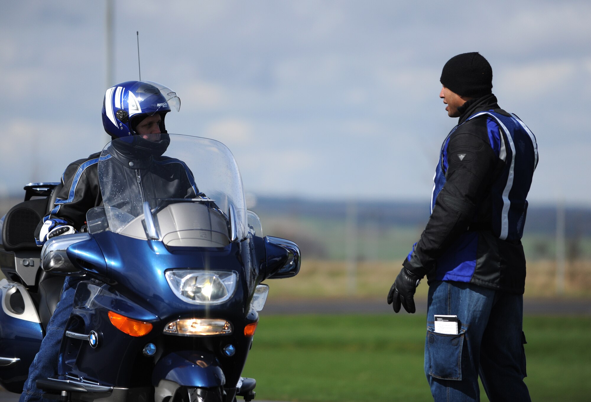 SPANGDAHLEM AIR BASE, Germany – Mike Novak, Air Force Engineering and Technical Services representative, gets advice from Staff Sgt. Viktor Hancock, 52nd Logistics Readiness Squadron, during a motorcycle safety course April 1. The course is taught by certified instructors from the Motorcycle Safety Foundation. (U.S. Air Force photo/Senior Airman Nathanael Callon)