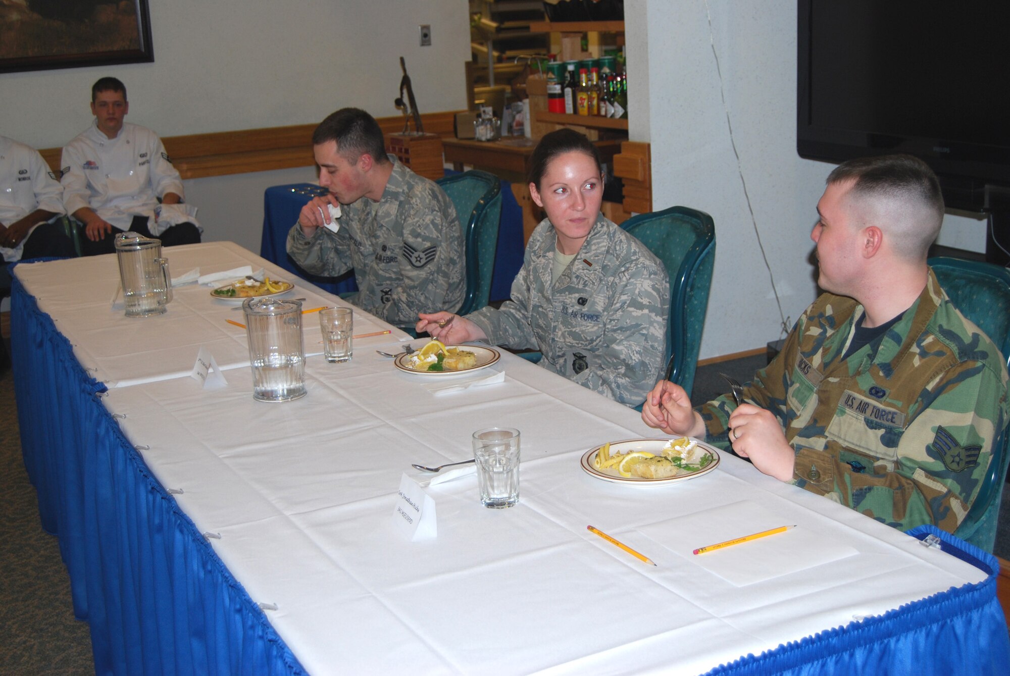 The judges for this competition were members of the 341st Missile Security Forces Squadron, who routinely rely on the chef to keep them fed while working in the missile complex. From top to bottom are Staff Sgt. Logan Fitzgerald, 2nd Lt. Julie Roloson and Senior Airman Jonathan Hicks.(U.S Air Force photo/Airman 1st Class Kristina Overton)