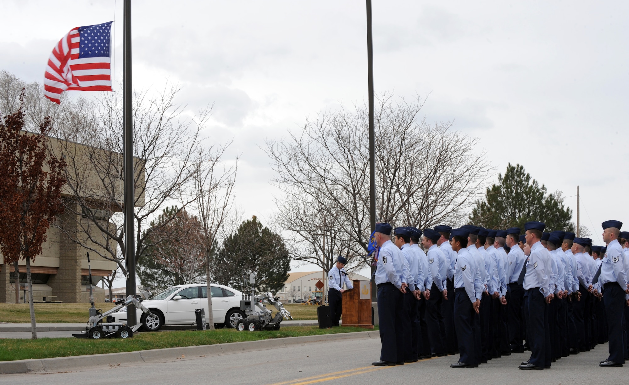 MOUNTAIN HOME AIR FORCE BASE, Idaho -- Airmen from the 366th Civil Engineering Squadron gather in formation before retreat held in front of the 366th Fighter Wing Headquarters March 29. 366th CES hosted the retreat in memory of Tech. Sgt. Walt Moss, 366th CES explosive ordnance disposal apprentice. Sergeant Moss was the first United States Air Force EOD Airman to be killed in combat since the start of Operation Enduring Freedom and Operation Iraqi Freedom, and was killed near Baghdad during safing operations. (U.S. Air Force photo by Airman 1st Class Debbie Lockhart)