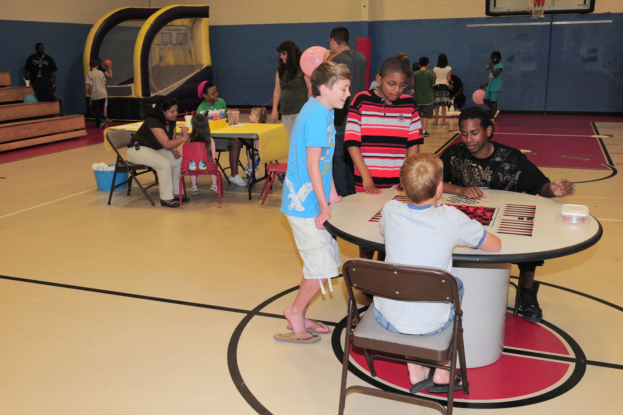 SHAW AIR FORCE BASE, S.C. -- Children of Team Shaw members gather to play carnival games during the Month of the Military Child carnival here April 1. (U.S. Air Force photo/Senior Airman David Minor)