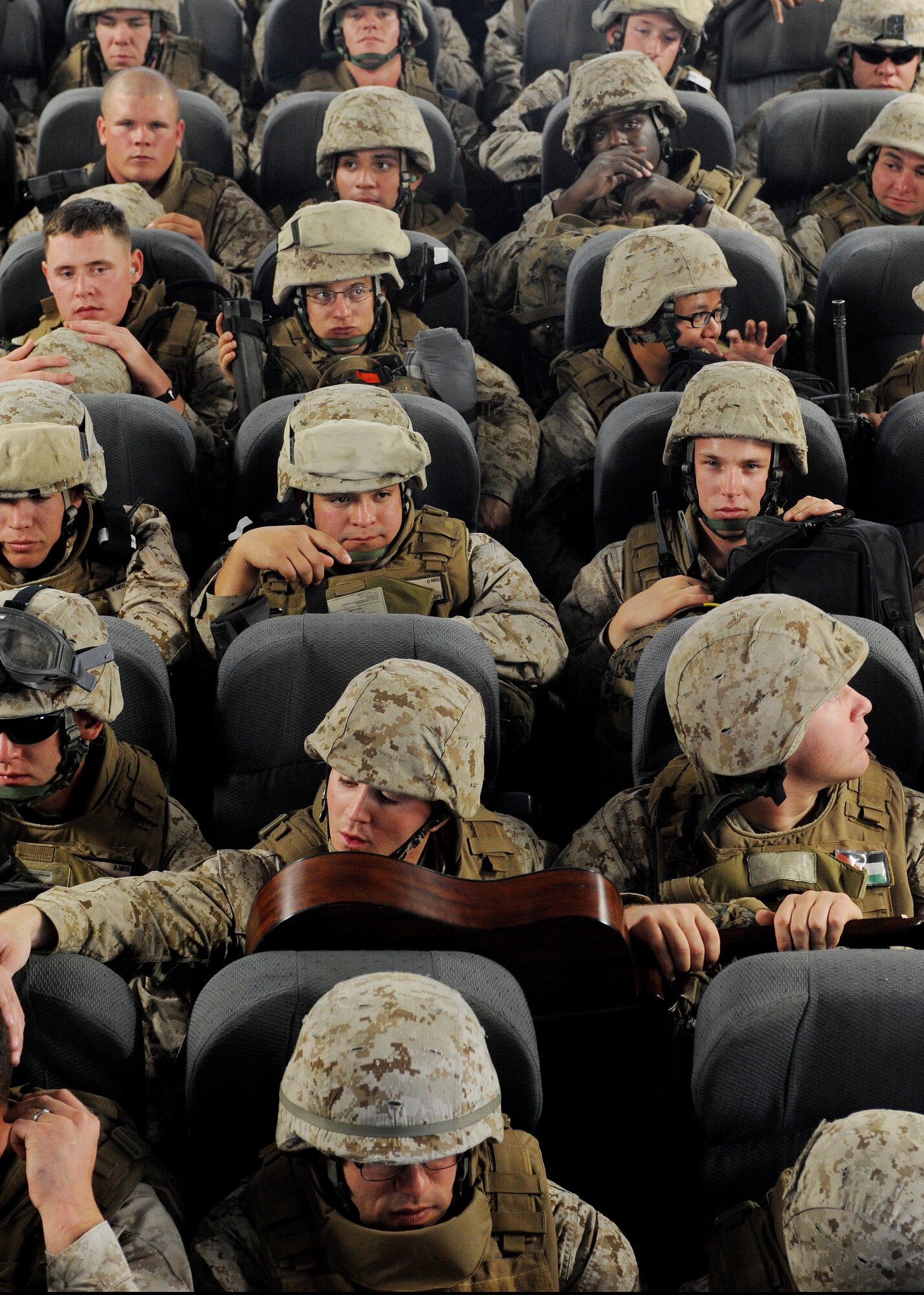 Marines from the 7th Engineer Support Battallion, Marine Corps Base Camp Pendleton, Calif.,  load onto a C-17 Globemaster III at the Transit Center at Manas, Kyrgyzstan, en route to Afghanistan, after spending a couple of days in transit here April 2, 2010. Thousands of Marines, Soldiers, Airmen and coalition troops transit through here each month in support of Operation Enduring Freedom. In March the 376th Expeditionary Logistics Readiness Squadron set a record, pushing through 50,000 multi-national, U.S. and coalition troops.  (U.S. Air Force photo/Senior Airman Nichelle Anderson/released)