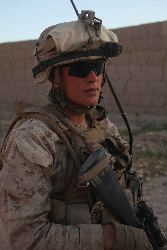 U.S. Marines with 1st Battalion 2nd Marines (1/2) provide security and talk to one another after an Improvised Explosive Device was used against their convoy, no Marines were injured in the attack.  Marines with 1/2 are participating in combat operations in the Helmand Providence in support of Operation Enduring Freedom.  (Official Marine Corps photo by Sgt Sean Baldwin)