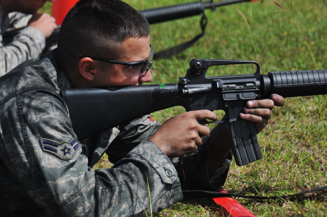 ANDERSEN AIR FORCE BASE, Guam - With an Operational Readiness Inspection rapidly approaching, the 36th Wing participated in a wing-wide Ability to Survive and Operate "Rodeo" here March 30, 2010. The training differed from previous rodeos in that it was not set up in a circuit format. Instead, both chalks were divided down into approximately five groups. Each group was assigned a sector which included a tent, water supply and some sort of vehicle. Once split into the groups all the sectors had to respond simultaneously and accordingly to the scenarios as they were inserted into the scenario. Areas of focus ranged from decontamination, transition points, chemical gear wear check, self-aid and buddy care, unexploded ordnance, land-mobile radio, and also M-16. Throughout the rodeo exercise evaluation team members graded the participants on every aspect of their performance.  (U.S. Air Force photos by Airman 1st Class Julian North)