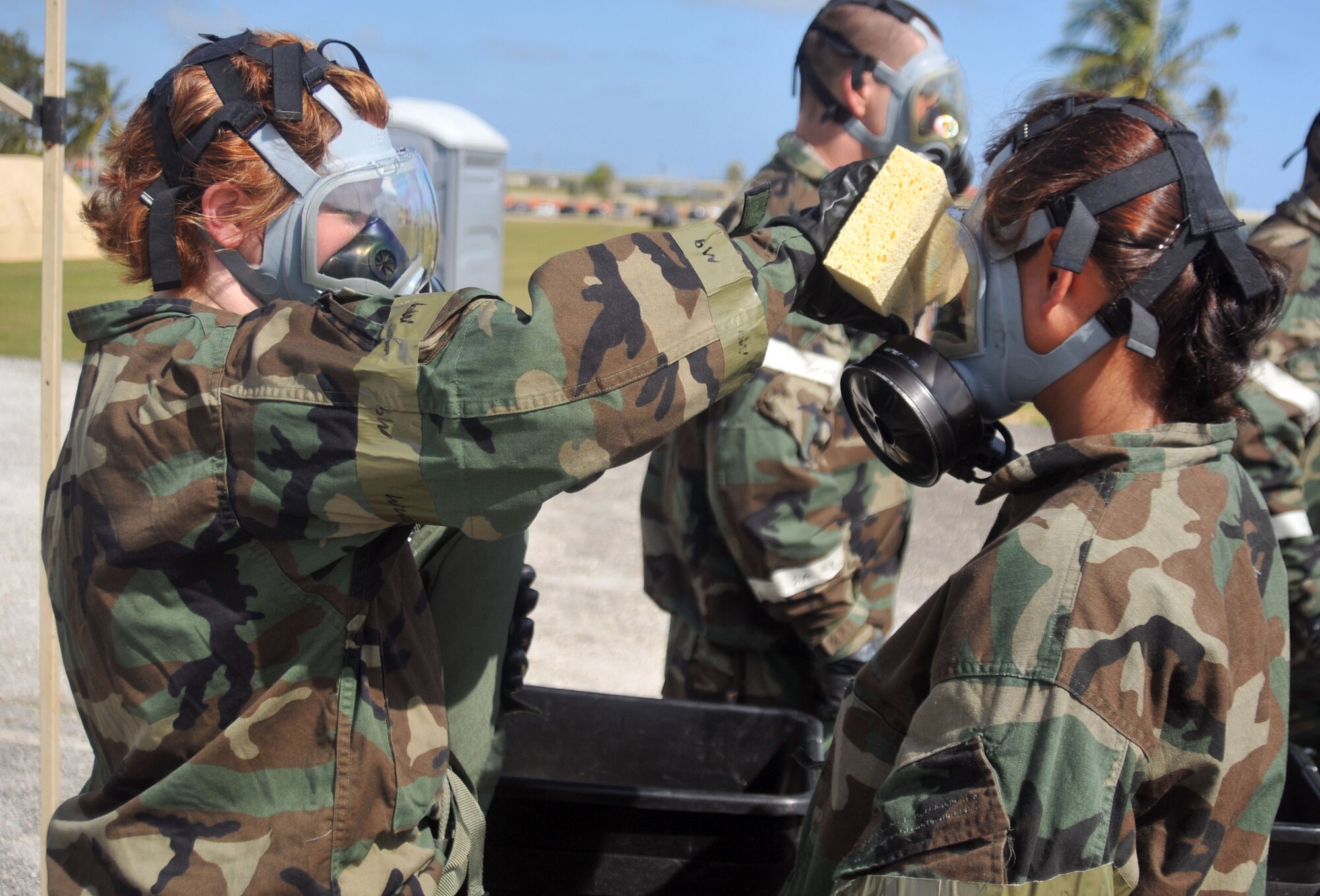 ANDERSEN AIR FORCE BASE, Guam - With an Operational Readiness Inspection rapidly approaching, the 36th Wing participated in a wing-wide Ability to Survive and Operate "Rodeo" here March 30, 2010. The training differed from previous rodeos in that it was not set up in a circuit format. Instead, both chalks were divided down into approximately five groups. Each group was assigned a sector which included a tent, water supply and some sort of vehicle. Once split into the groups all the sectors had to respond simultaneously and accordingly to the scenarios as they were inserted into the scenario. Areas of focus ranged from decontamination, transition points, chemical gear wear check, self-aid and buddy care, unexploded ordnance, land-mobile radio, and also M-16. Throughout the rodeo exercise evaluation team members graded the participants on every aspect of their performance.  (U.S. Air Force photos by Airman 1st Class Julian North)

