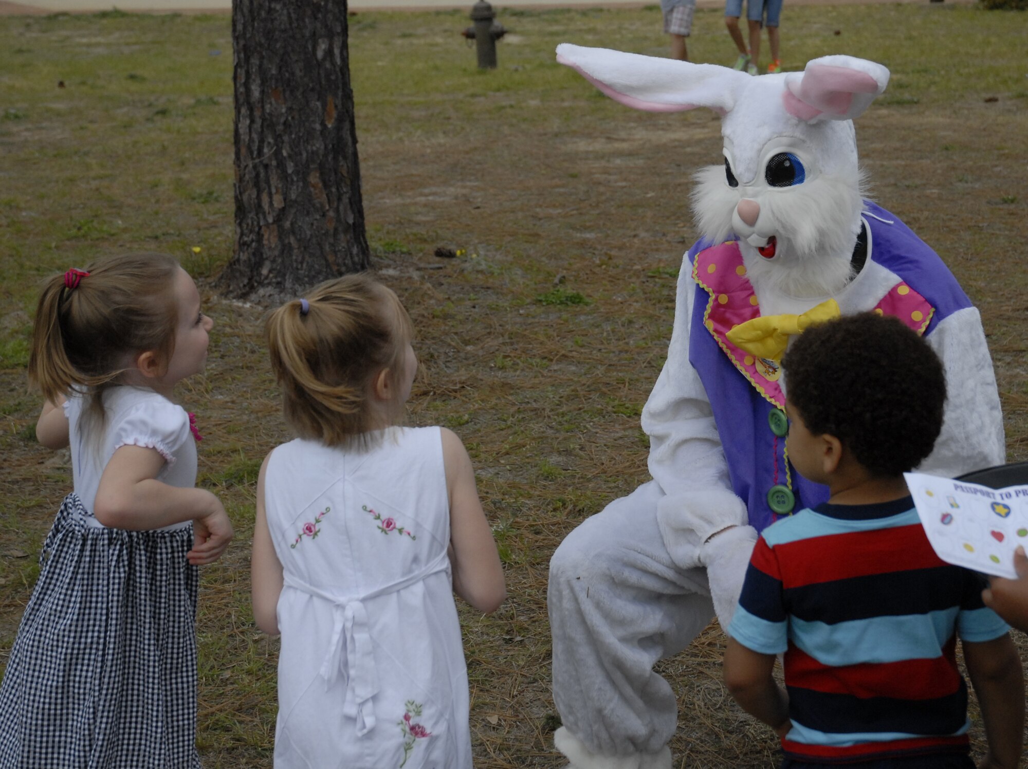 Children visit with the Easter Bunny at the tenth annual Family Fest and Egg Hunt at the Hurlburt Field Community Park April 3. The event was coordinated by the 1st Special Operations Force Support Squadron and sponsoring agencies for family entertainment during the holiday weekend. (U.S. Air Force photo by Airman 1st Class Joe McFadden)