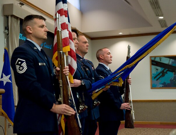 (From Left to Right) Master Sgt. Jayme Jackson, 99th Logistics Readiness Squadron first sergeant, Master Sgt. Cathrine Beck, 11th Reconnaissance Squadron first sergeant, Master Sgt. Robert Workman, U.S. Air Force Weapons School first sergeant, and Master Sgt. Stanley Joselin, 99th Communications Squadron first sergeant, post the colors at the Nellis “Honor the Honor Guard” luncheon April 1. Each year, Nellis and community leaders hold a luncheon to honor these liaisons to the Air Force and show how their service as the Nellis Honor Guard has made a difference in the community.(U.S. Air Force photo by Airman 1st Class Jamie Nicley)