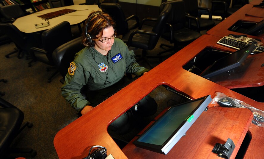 OFFUTT AIR FORCE BASE, Neb. -- Master Sgt. Paula Malott, an Arabic linguist and chief of Standardization and Evaluations with the 97th Intelligence Squadron, utilizes training software at the Language Learning Center here March 31 to maintain language proficiency. Sergeant Malott has spent her 20-plus year career with the Air Force as a linguist and has deployed more than 20 times in support of contingency operations. U.S. Air Force photo by Josh Plueger