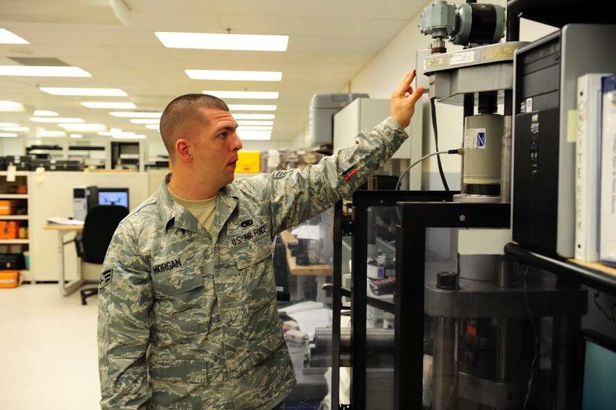 SHAW AIR FORCE BASE, S.C. -- Senior Airman David Morgan, 20th Component Maintenance Squadron equipment technician, checks the calibration of a load cell here March 30. The Precision Measurement Equipment Laboratory calibrates a wide variety of tools and equipment to ensure that the equipment is ready to use. (U.S. Air Force photo/Airman 1st Class Neil D. Warner)