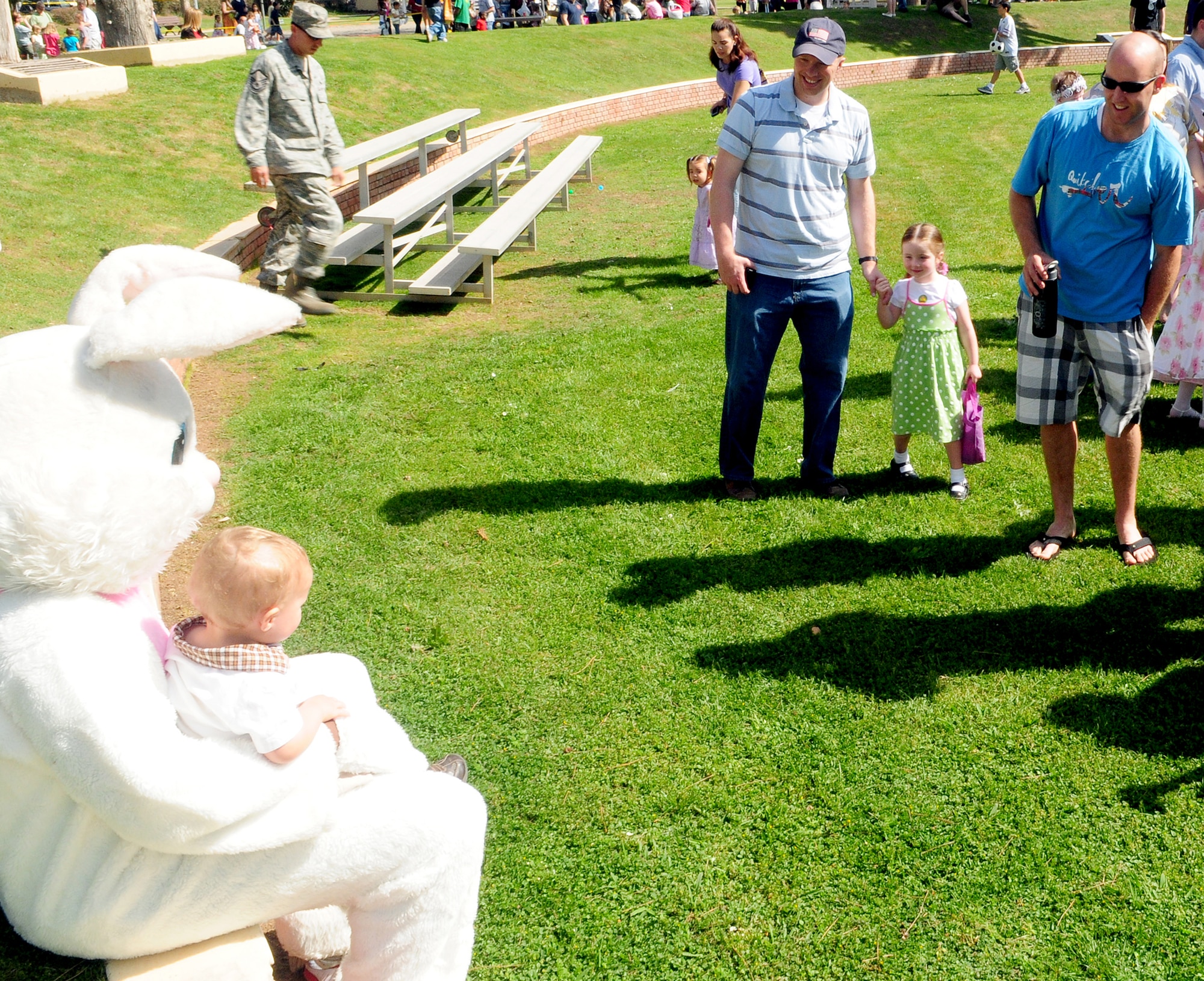 Preston Lemen, son of Staff Sgt. Walter Lemen, 39th Communications Squadron, poses with the Easter Bunny to have his photo taken during a base Easter celebration at Arkadas Park Saturday, April 3, 2010 at Incirlik Air Base, Turkey. The celebration included Easter egg hunts for various ages, an inflatable castle dunk tank and vendors. Hundreds of children participated in the egg hunts. (U.S. Air Force photo/Senior Airman Alex Martinez)