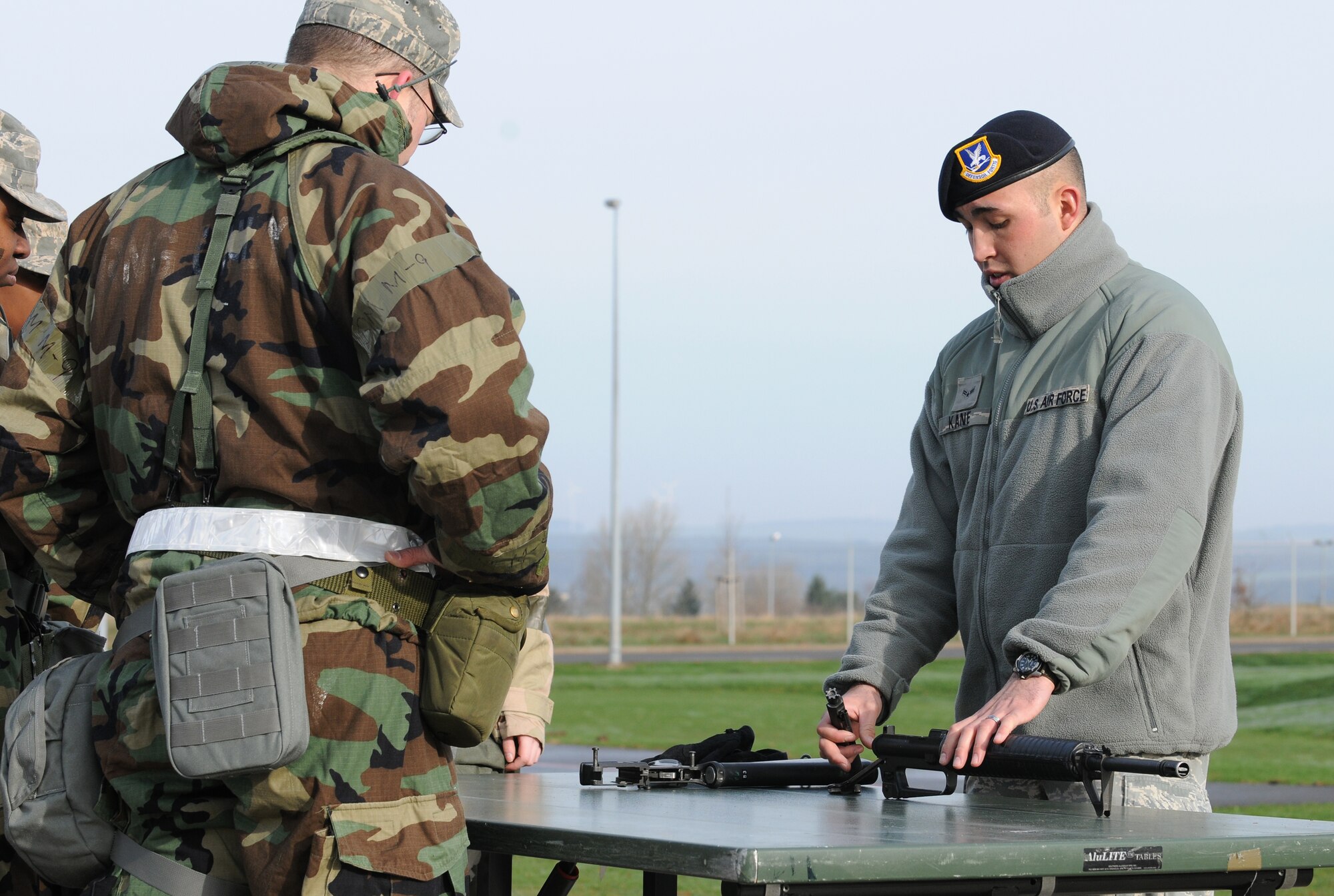 SPANGDAHLEM AIR BASE, Germany – Airman 1st Class Charles Kane, 52nd Security Forces Squadron patrolman, demonstrates the assembly of an M-16A2 rifle during individual core competency skills training April 2. The training reviewed individual chemical, biological, radiological and nuclear defense; weapon proficiency; first aid; post attack reconnaissance and fire fighting to prepare active participants in the NATO Force Evaluation this summer. (U.S. Air Force photo/Senior Airman Nathanael Callon)