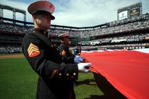 Soldiers, Sailors, Airmen, and Marines participated in the Met 2010 season opener, unveiling the American Flag in the outfield of Citi Field, in Queens, N.Y., on April 05, 2010. The Marines of First Marine Corps District, 2nd battalion, 25th Marines, and 6th Communications Battalion joined other Armed Forces Service Members from all over the eastern region.