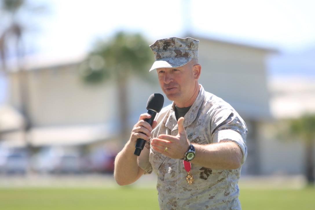 Col. Wes Weston, the former assistant chief of staff of Installations and Logistics, speaks to his friends and family during his retirement ceremony April 6 at Lance Cpl. Torrey L. Gray Field.