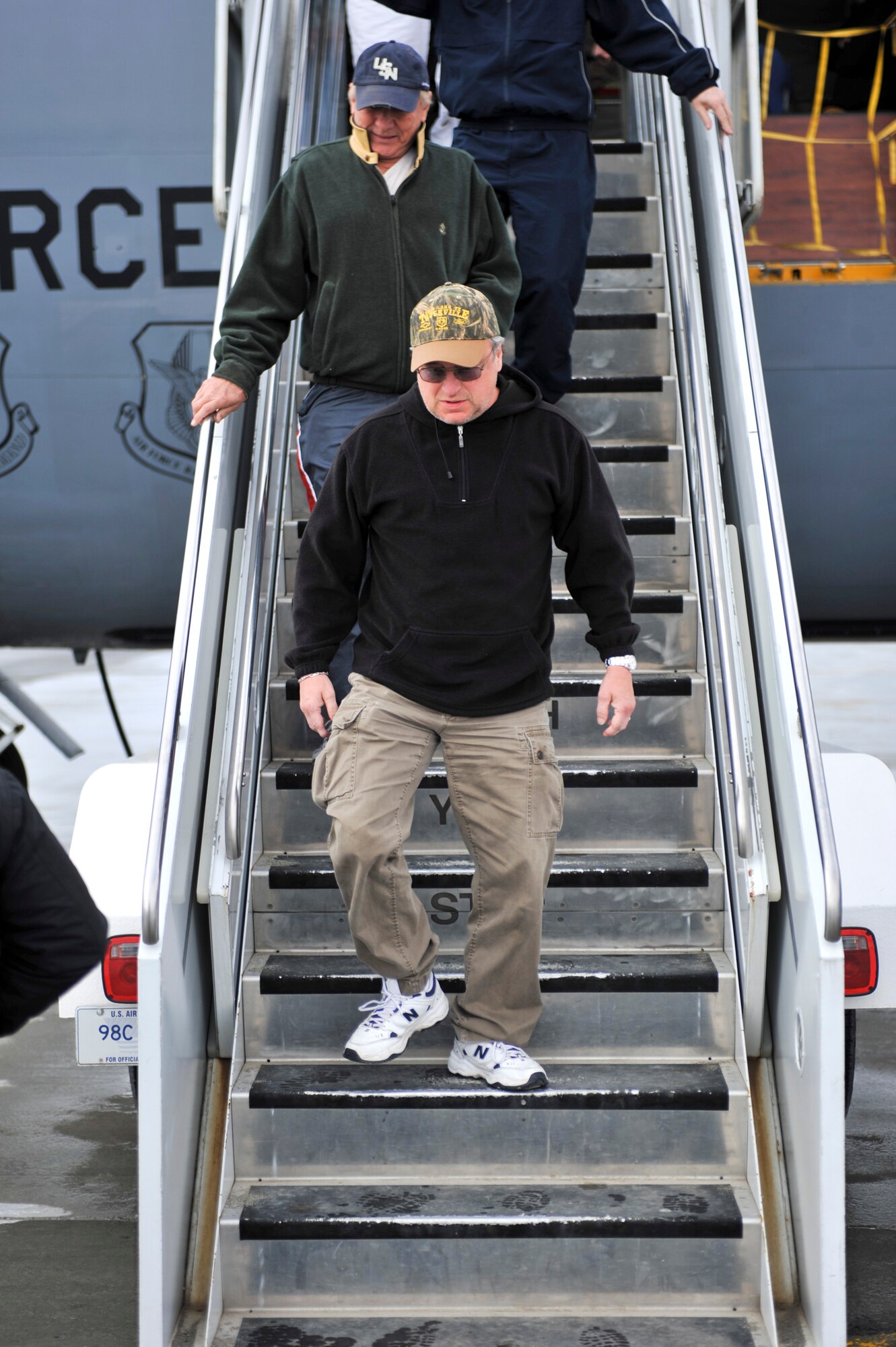 ELMENDORF AIR FORCE BASE, Alaska – Mark Chesnutt, country singer-songwriter, makes his way off of a MacDill AFB KC 135 April 6, while stopping at Elmendorf to refuel. Mr. Chesnutt is en route to Kunsan Air Base where he is expected to perform at Kunsan’s unit compliance inspection after party. One of Mr. Chesnutt’s more notable songs is “Bubba Shot the Jukebox.” (Air Force photo by Airman 1st Class Christopher Gross) 