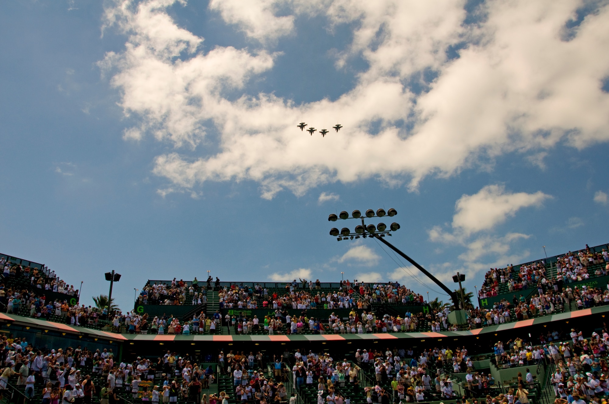 F-16’s from the 93rd Fighter Squadron “Makos”, Homestead Air Reserve Base, Fla., conduct a flyover at the 2010 Sony Ericsson Open Tennis Tournament women’s final, April 3.  (U.S. Air Force photo/Tim Norton)