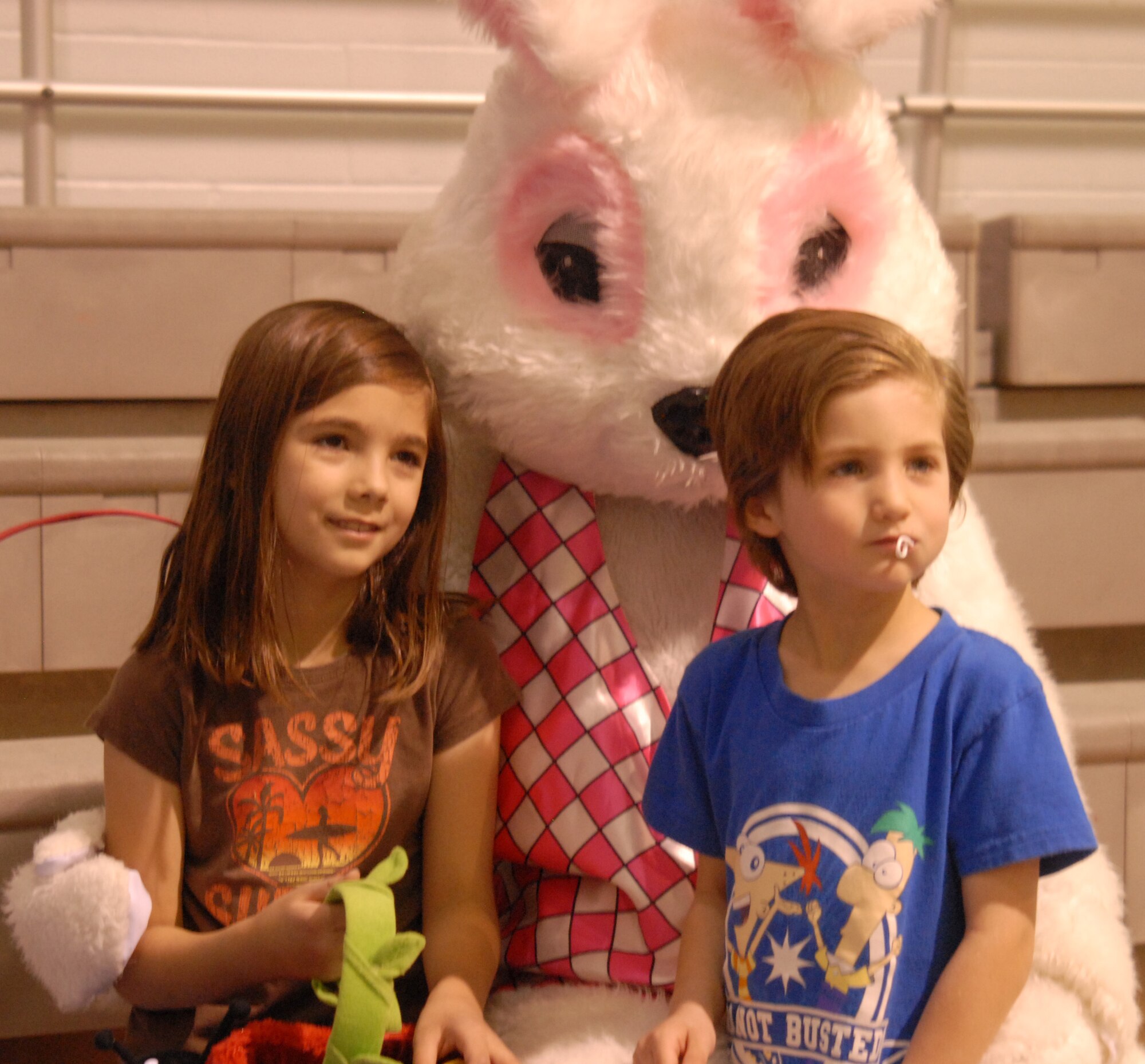 Elizabeth and David Maldonado, children of Tech. Sgt. Gary Maldonado, 17th Communications Squadron, pose with the bunny at the Base Wide Egg Hunt held at Goodfellow AFB, April 3. ( U.S. Air Force photo/Airman 1st Class Anne Gathua )