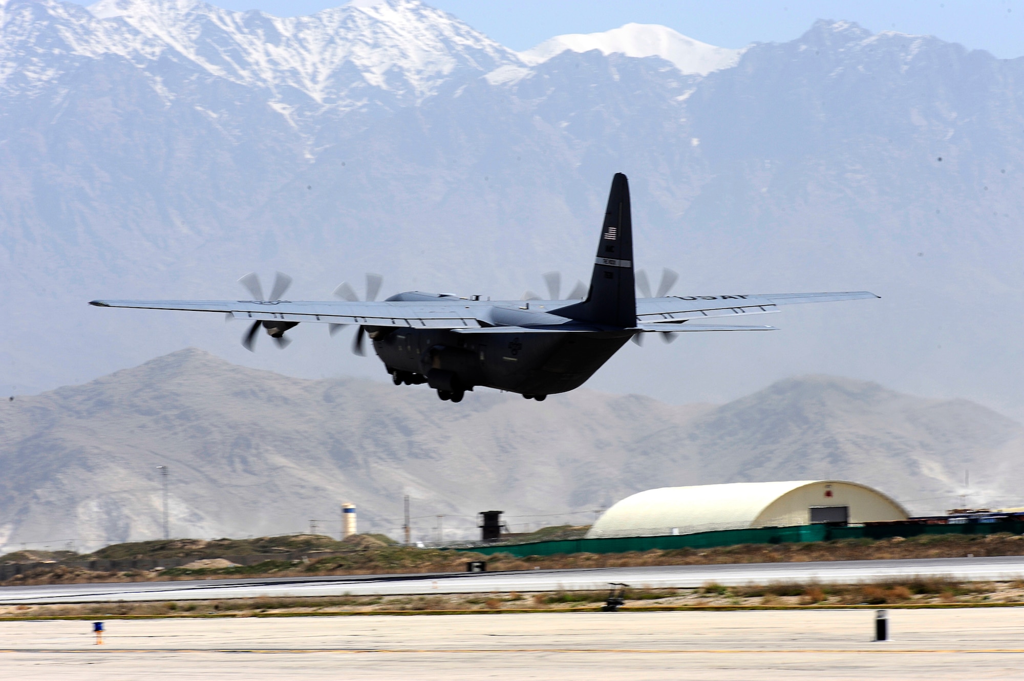 A C-130 Hercules takes off at Bagram Airfield, Afghanistan, April 6, 2010. The 455th Air Expeditionary Wing provides expeditionary combat and combat support to U.S. and coalition forces.  (U.S. Air Force photo/Tech. Sgt. Jeromy K. Cross)
