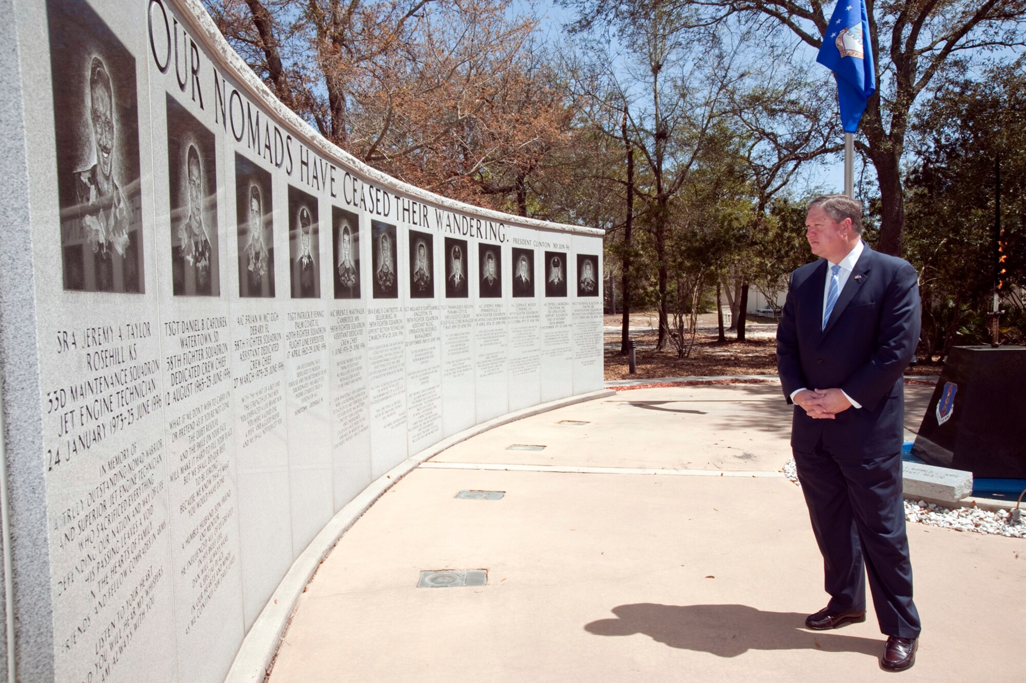 EGLIN AIR FORCE BASE, Fla. -- During his tour of the 33rd Fighter Wing April 2, Secretary of the Air Force Michael Donley reflects on lives of fallen heroes. The Nomad Memorial is dedicated to the 12 airmen who lost their lives in the Khobar Towers bombing June 25, 1996.   The SECAF spent the day visiting each of the major wings and talking with base leadership and Airmen.  (Courtesy photo)
