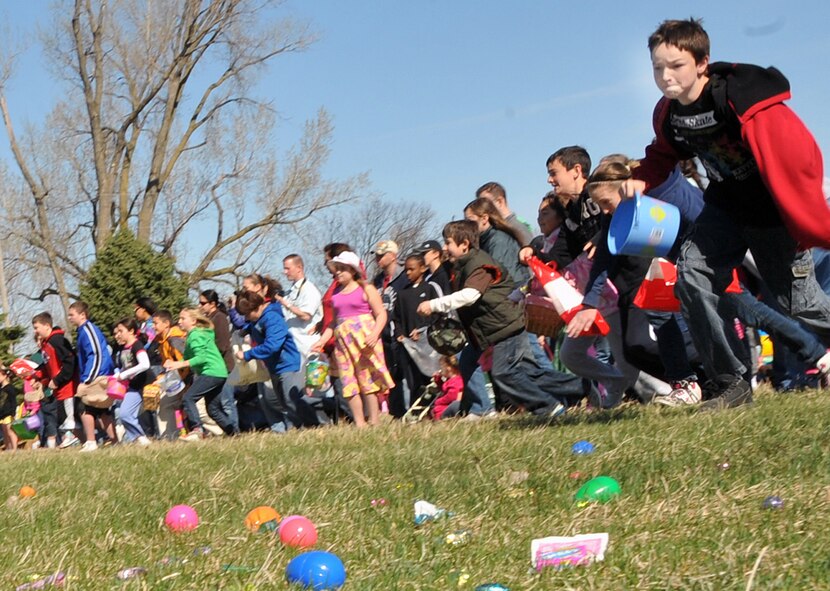 OFFUTT AIR FORCE BASE, Neb. -- Many children from the Offutt community begin searching for eggs at Offutt's annual Easter egg hunt at the Base Lake April 3. The event was one of several military families took part in during the holiday weekend. U.S. Air Force photo by Jeff W. Gates