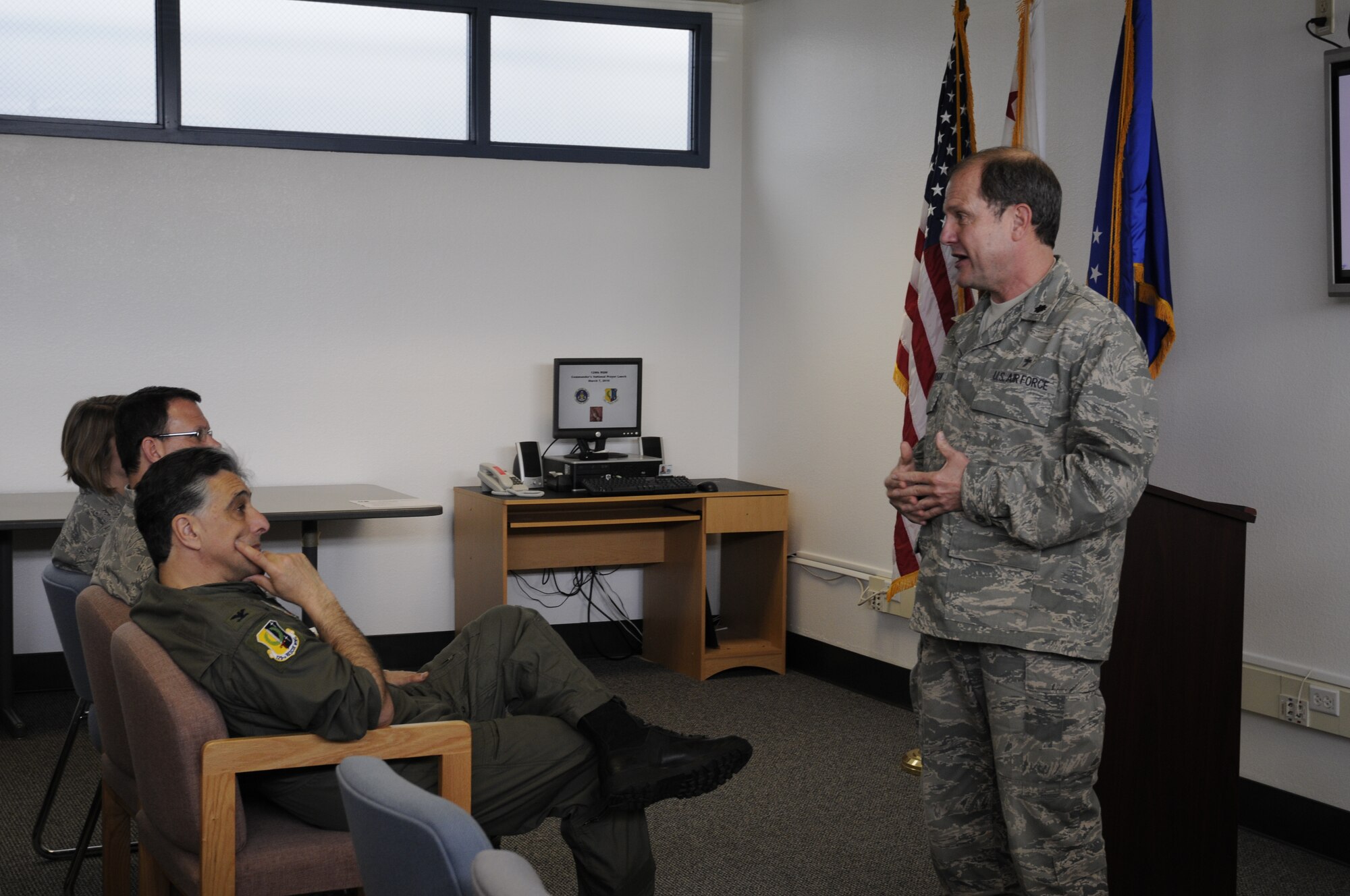 Lt. Col. Steven Torgerson, wing chaplain for the 60th Air Mobility Wing at Travis Air Force Base, Calif., speaks at the 129th Rescue Wing Commander’s National Prayer Lunch at Moffett Federal Airfield, Calif. on March 7. The lunch consisted of a musical selection from the 561st Air Force Band, a welcome speech given by Col. Amos Bagdasarian, the 129th RQW commander, and a brief history of the national prayer service by Maj. Ivan Williams, 129th RQW chaplain. (Air National Guard photo by Staff Sgt. Kim Ramirez)