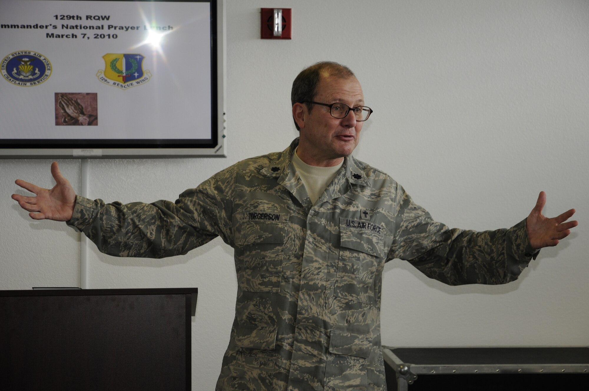 Lt. Col. Steven Torgerson, wing chaplain for the 60th Air Mobility Wing at Travis Air Force Base, Calif., speaks at the 129th Rescue Wing Commander’s National Prayer Lunch at Moffett Federal Airfield, Calif. on March 7. The lunch consisted of a musical selection from the 561st Air Force Band, a welcome speech given by Col. Amos Bagdasarian, the 129th RQW commander, and a brief history of the national prayer service by Maj. Ivan Williams, 129th RQW chaplain. (Air National Guard photo by Staff Sgt. Kim Ramirez)